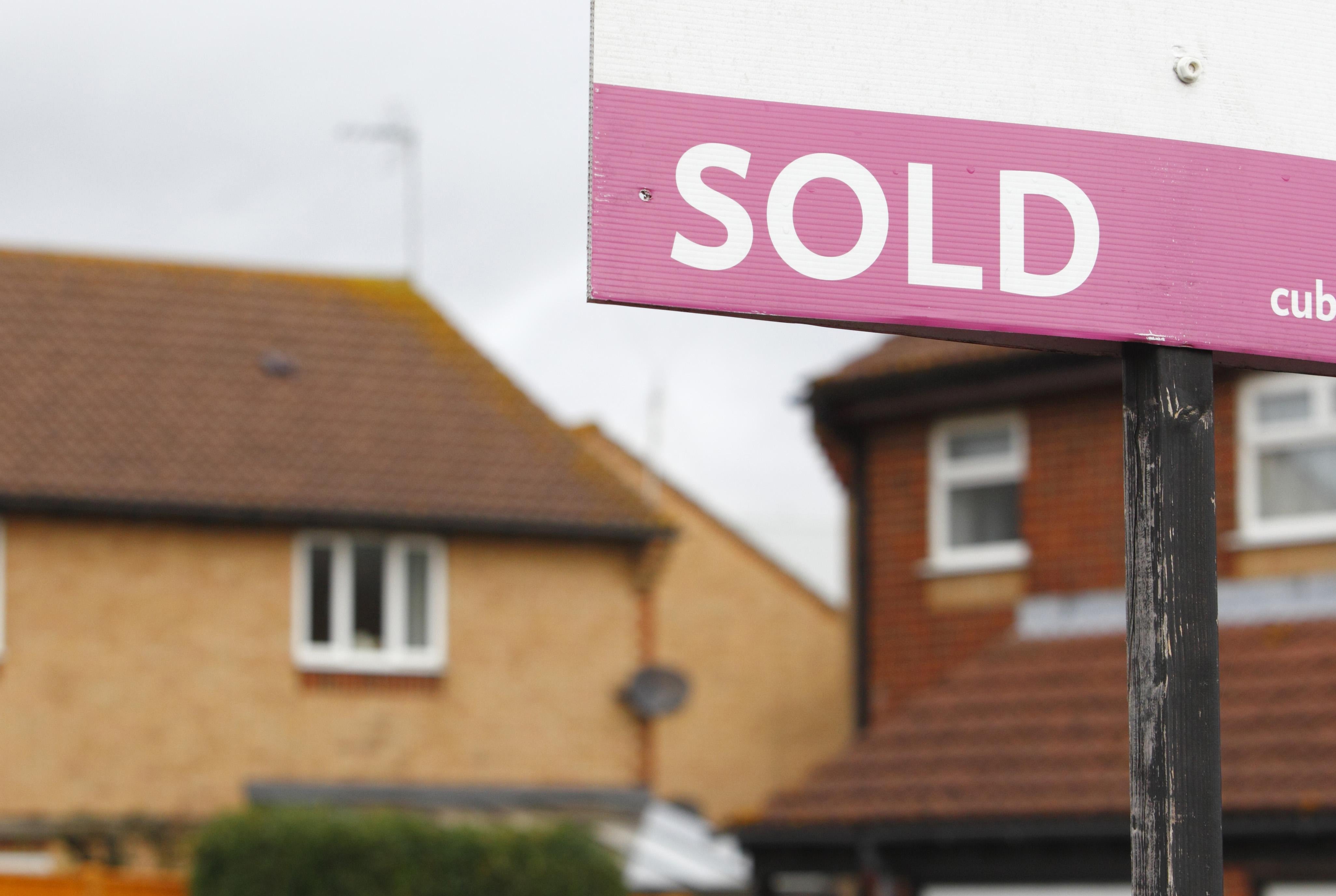 Houses with a sold sign