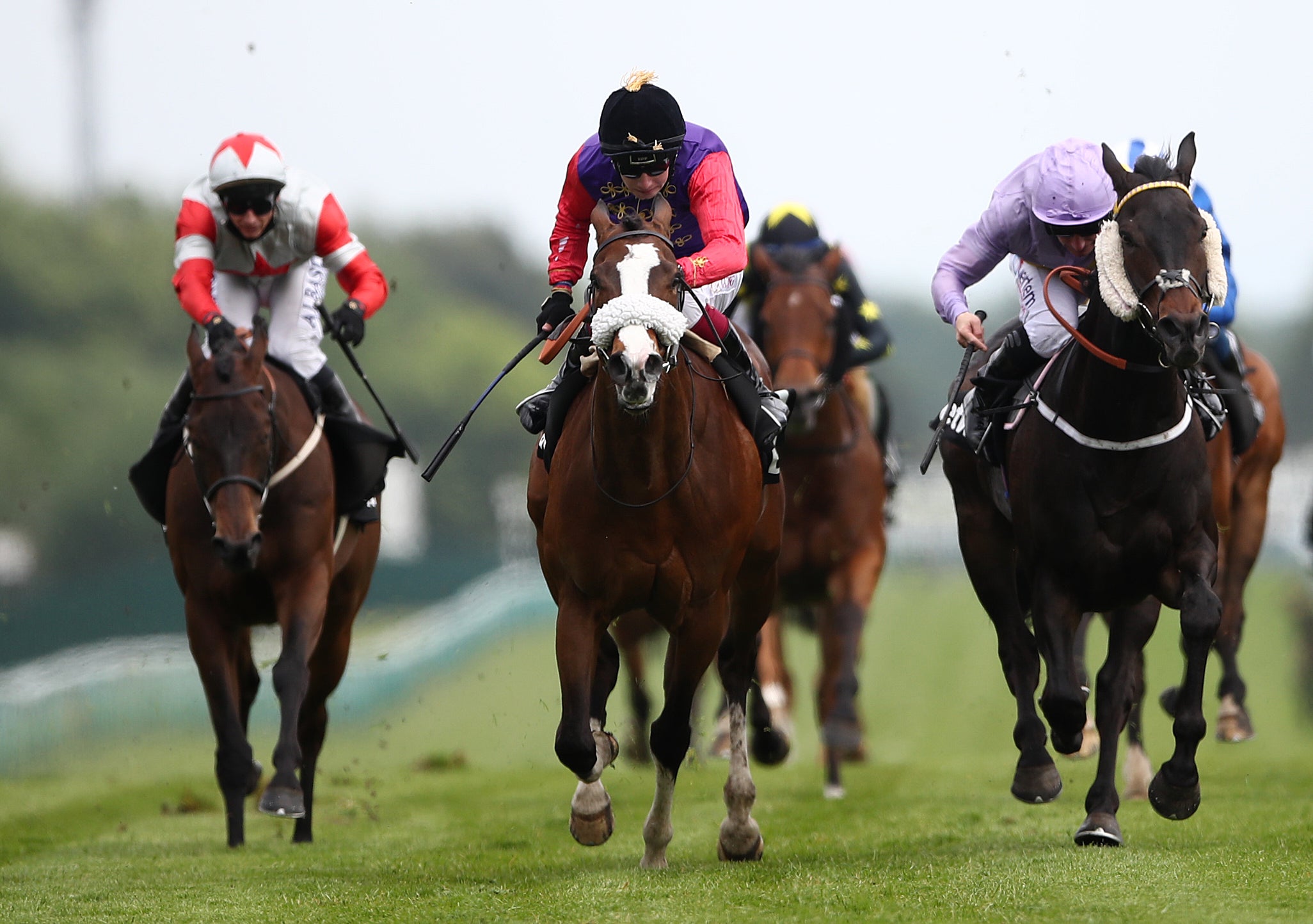 King’s Lynn (centre) wins the Achilles Stakes at Haydock