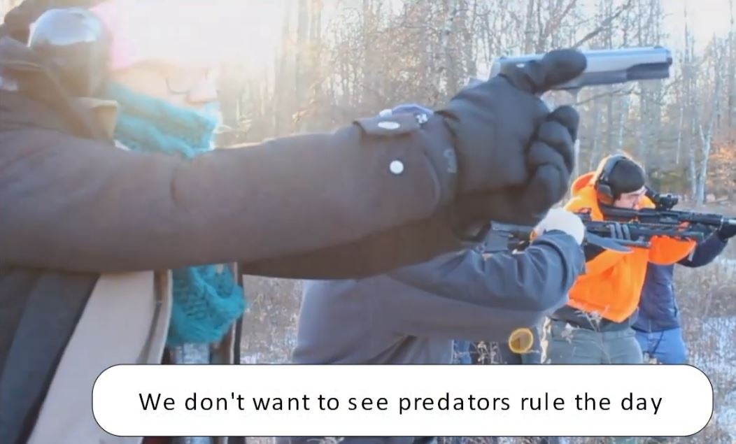 Members of the Sanctuary Church holding firearms in a promotional video for the religious group