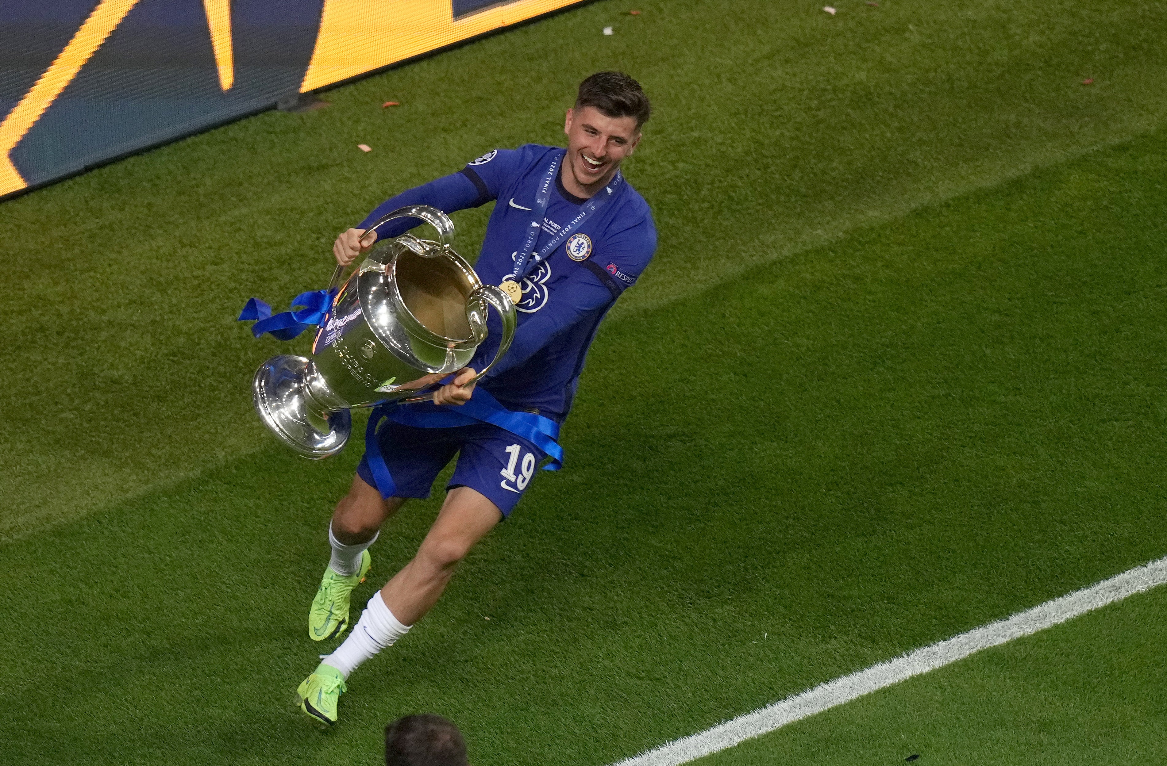 Chelsea’s Mason Mount celebrates with the trophy