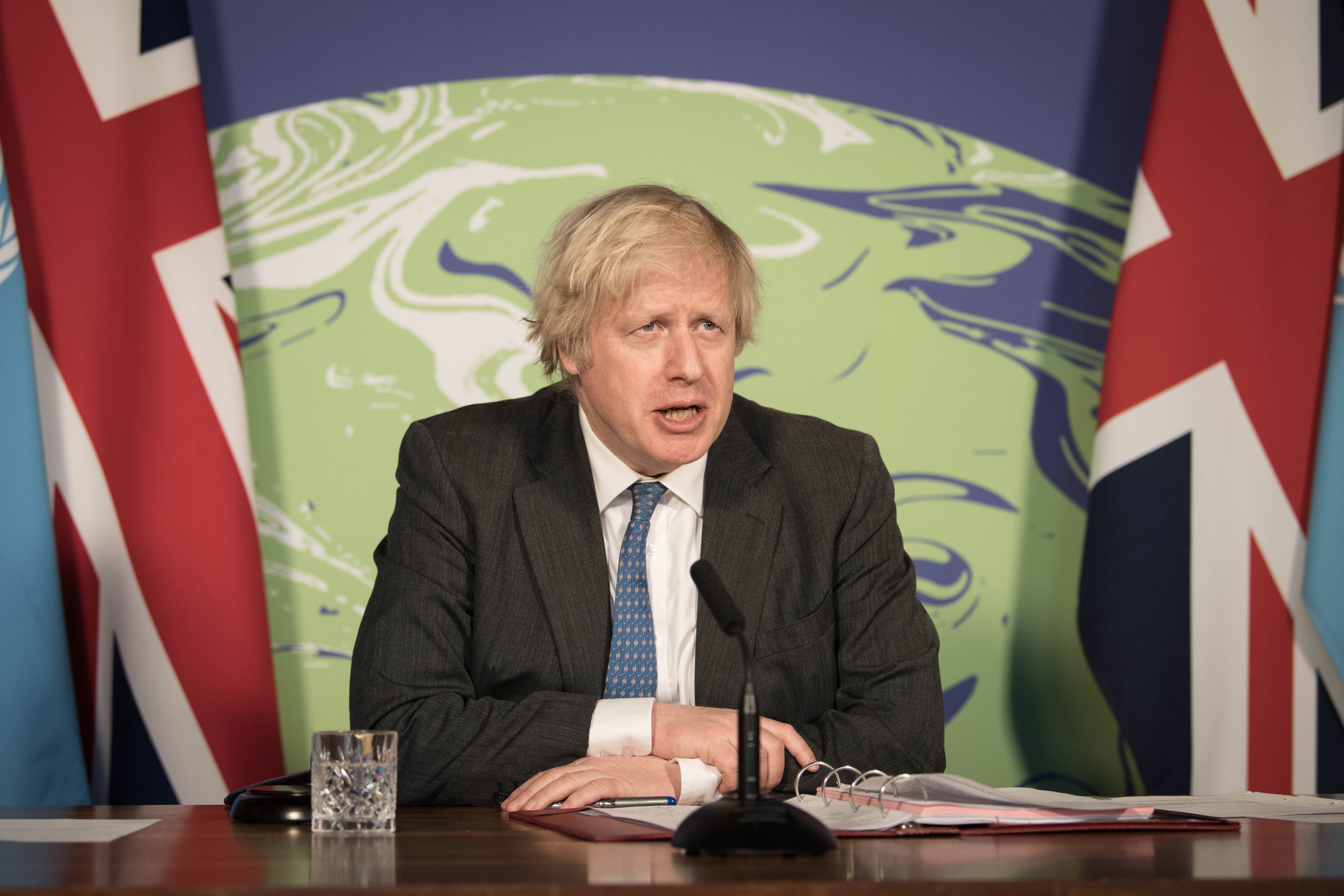 Johnson chairs a session of the UN Security Council on climate and security at the Foreign, Commonwealth and Development Office in February