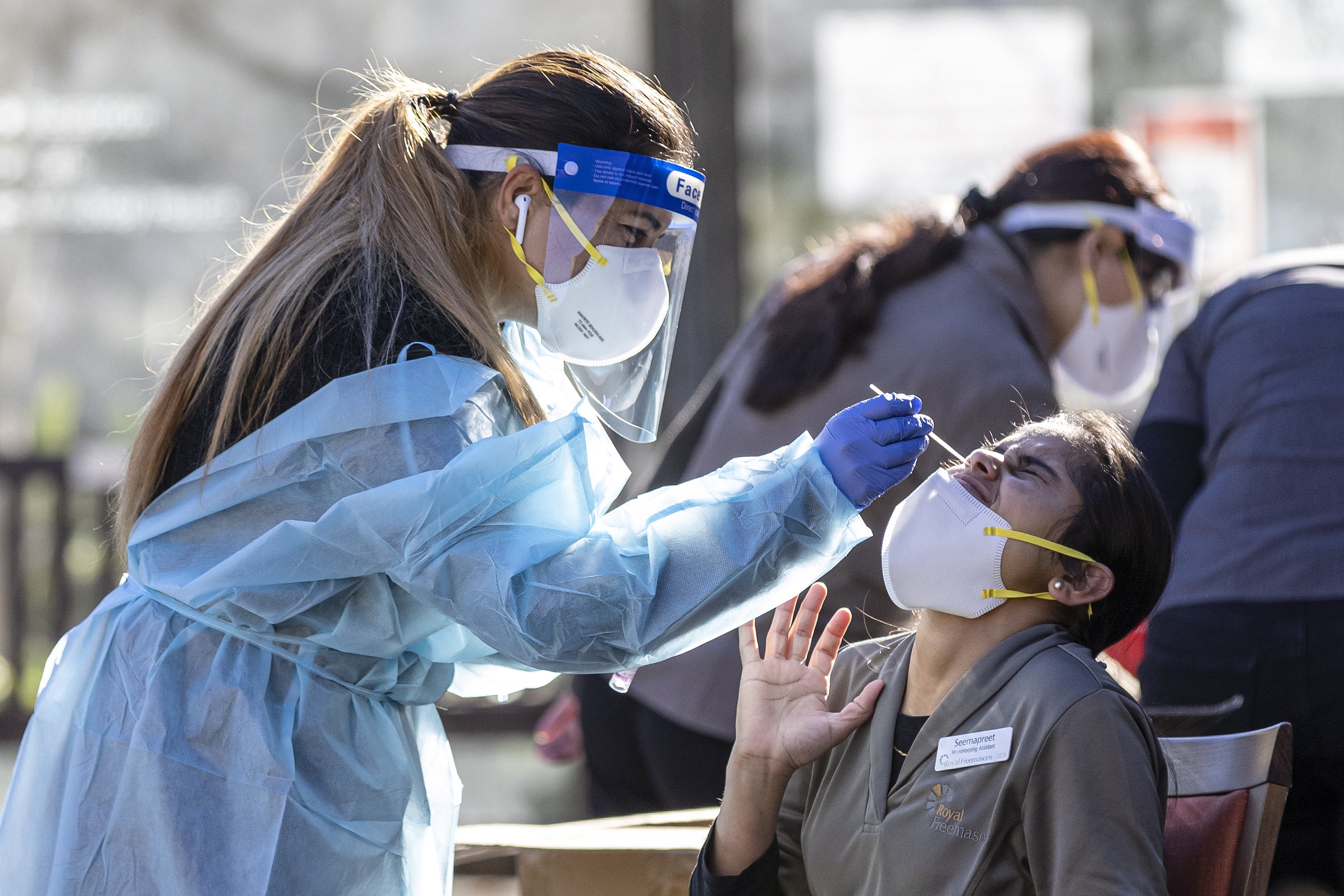 Staff members of the Royal Freemasons Coppin Centre get tested for Covid-19 in Melbourne. Victoria has entered a seven-day lockdown after a rise in Covid-19 cases