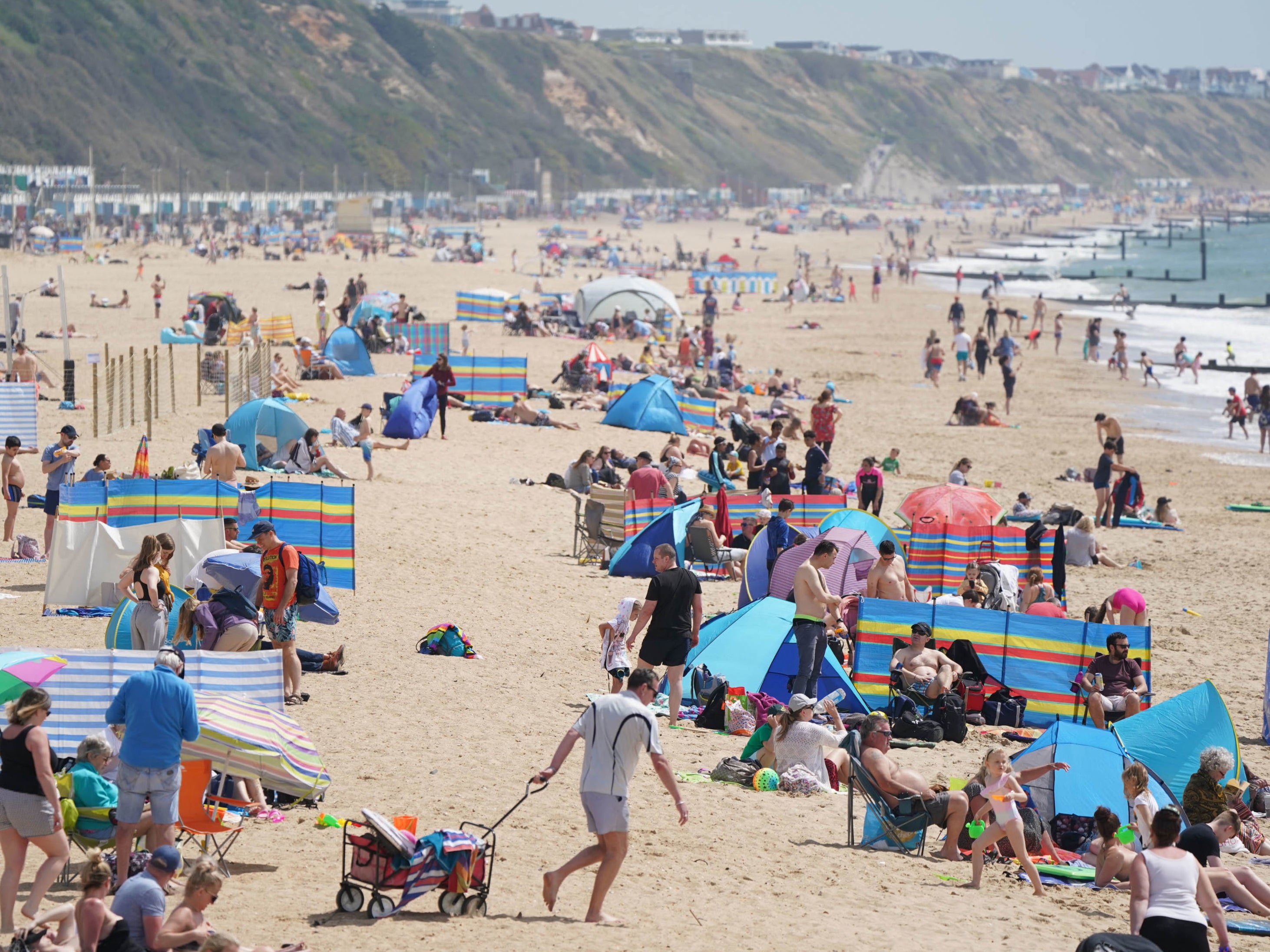 People gather on Boscombe beach