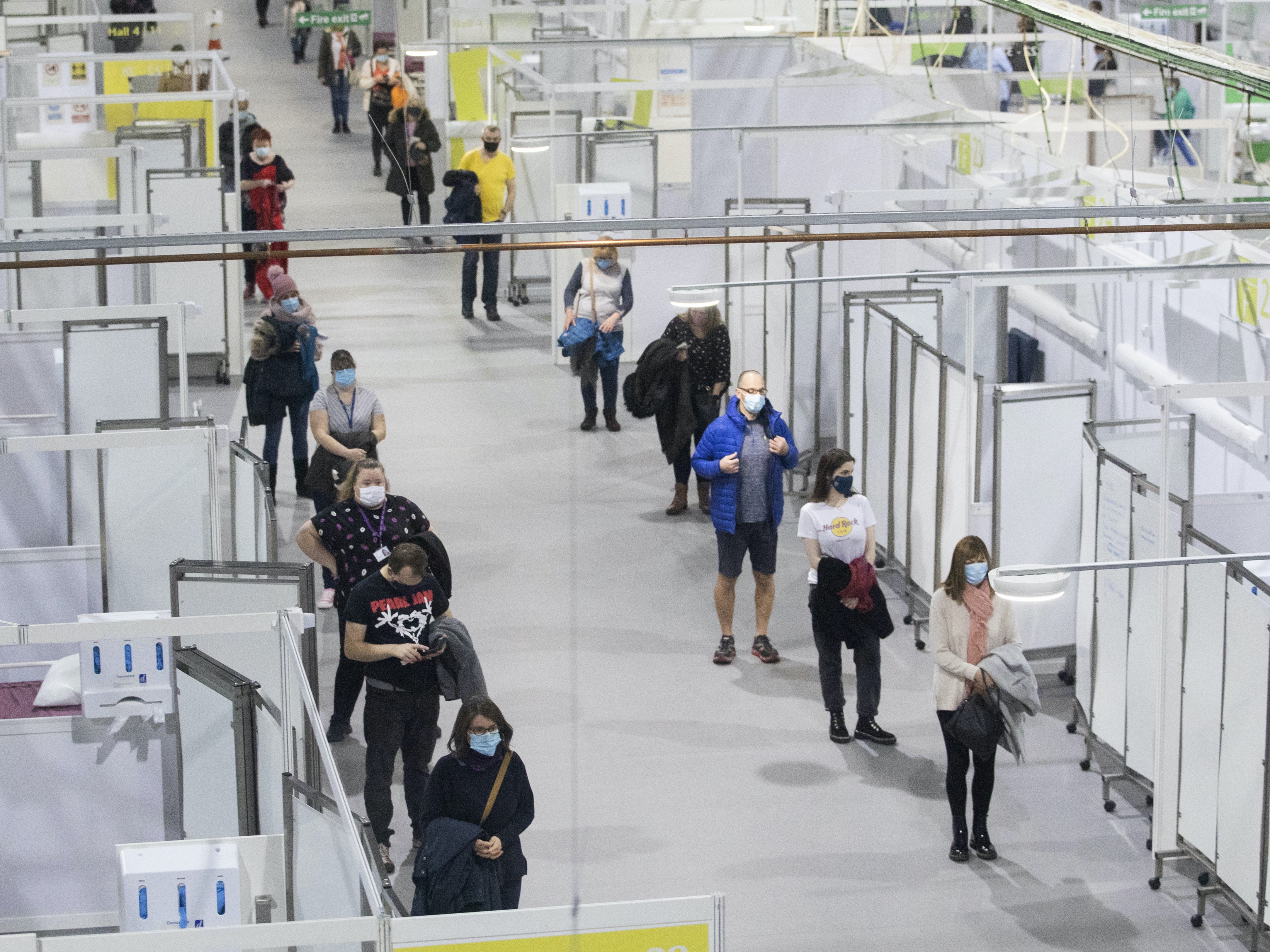 People queue for Covid vaccine at Glasgow’s SSE Hydro centre