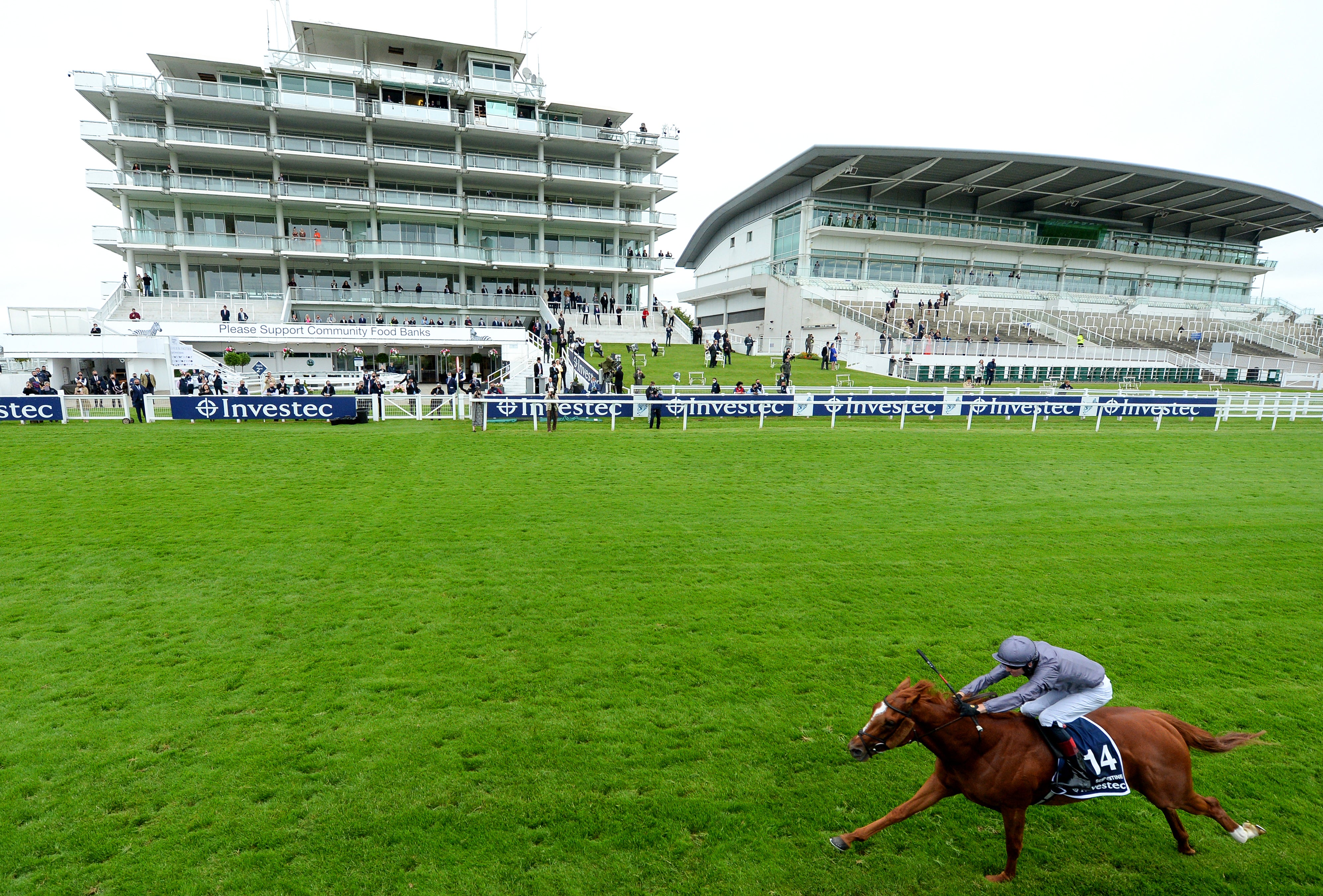 Serpentine, ridden by jockey Emmet McNamara, winning the Investec Derby at Epsom Racecourse