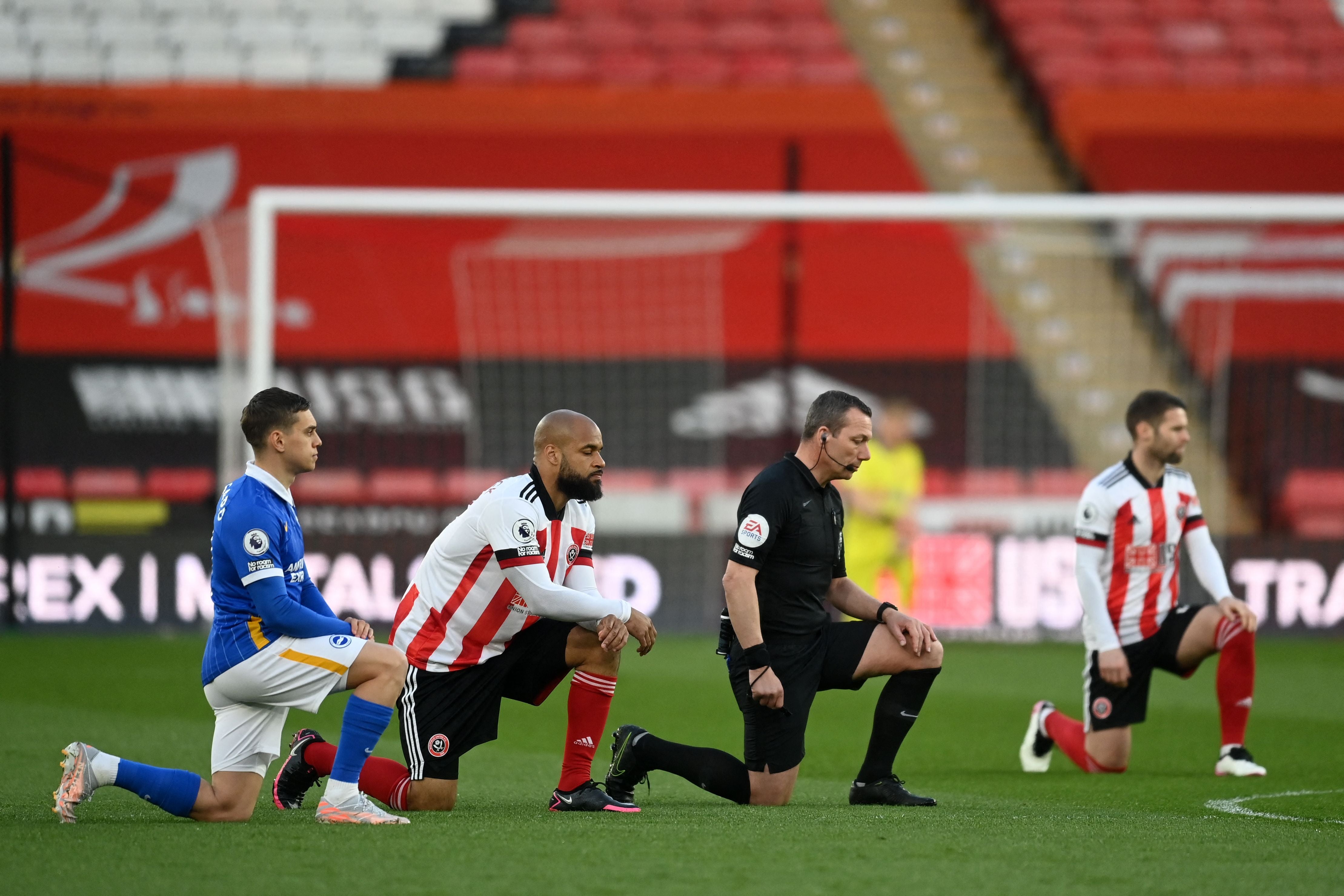 Referees have joined players in taking a knee before kick-off