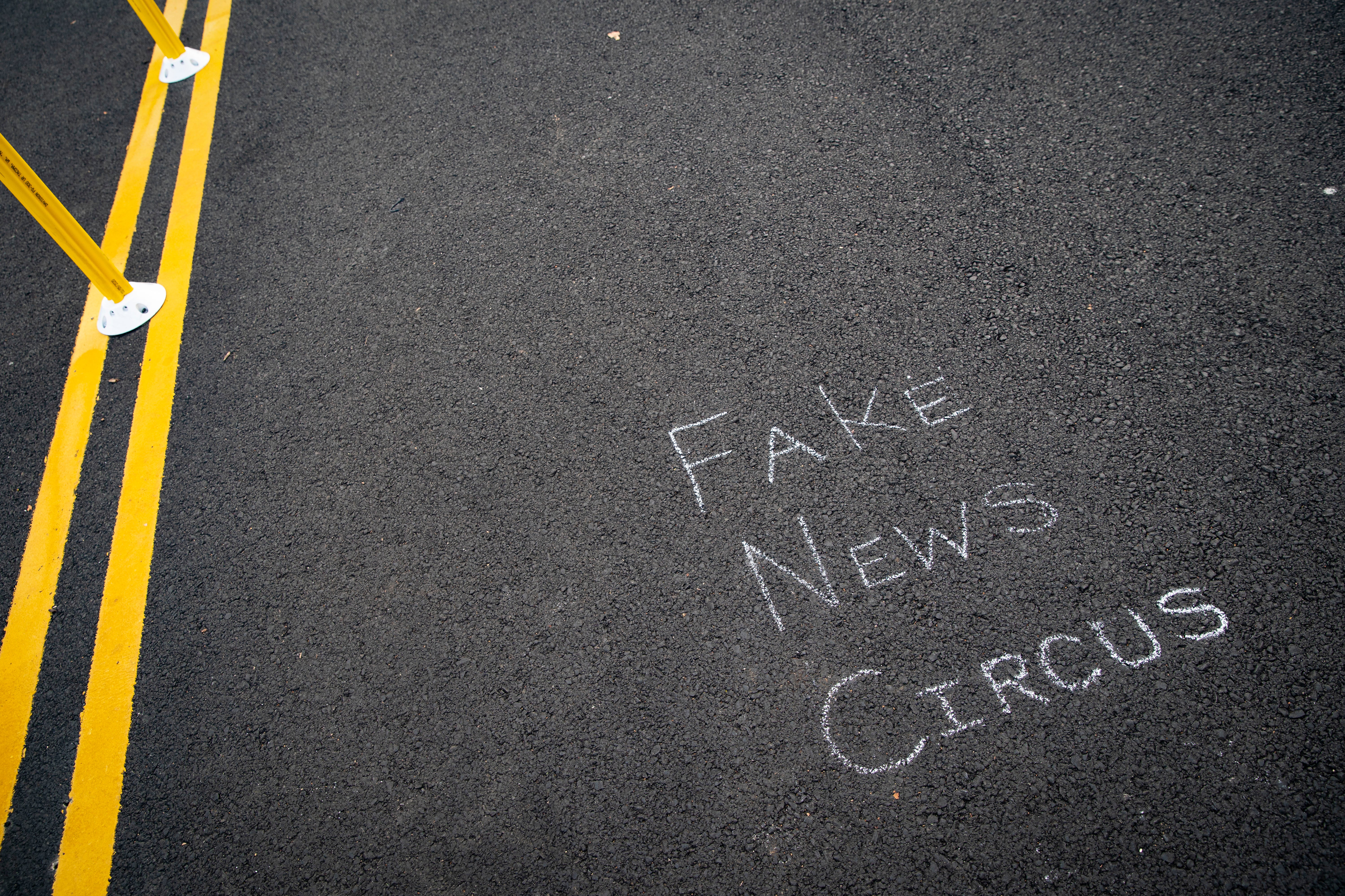 Representative: A chalk message about "Fake News" is written on the street at Black Lives Matter Plaza near the White House, on 5 November 2020 in Washington, DC