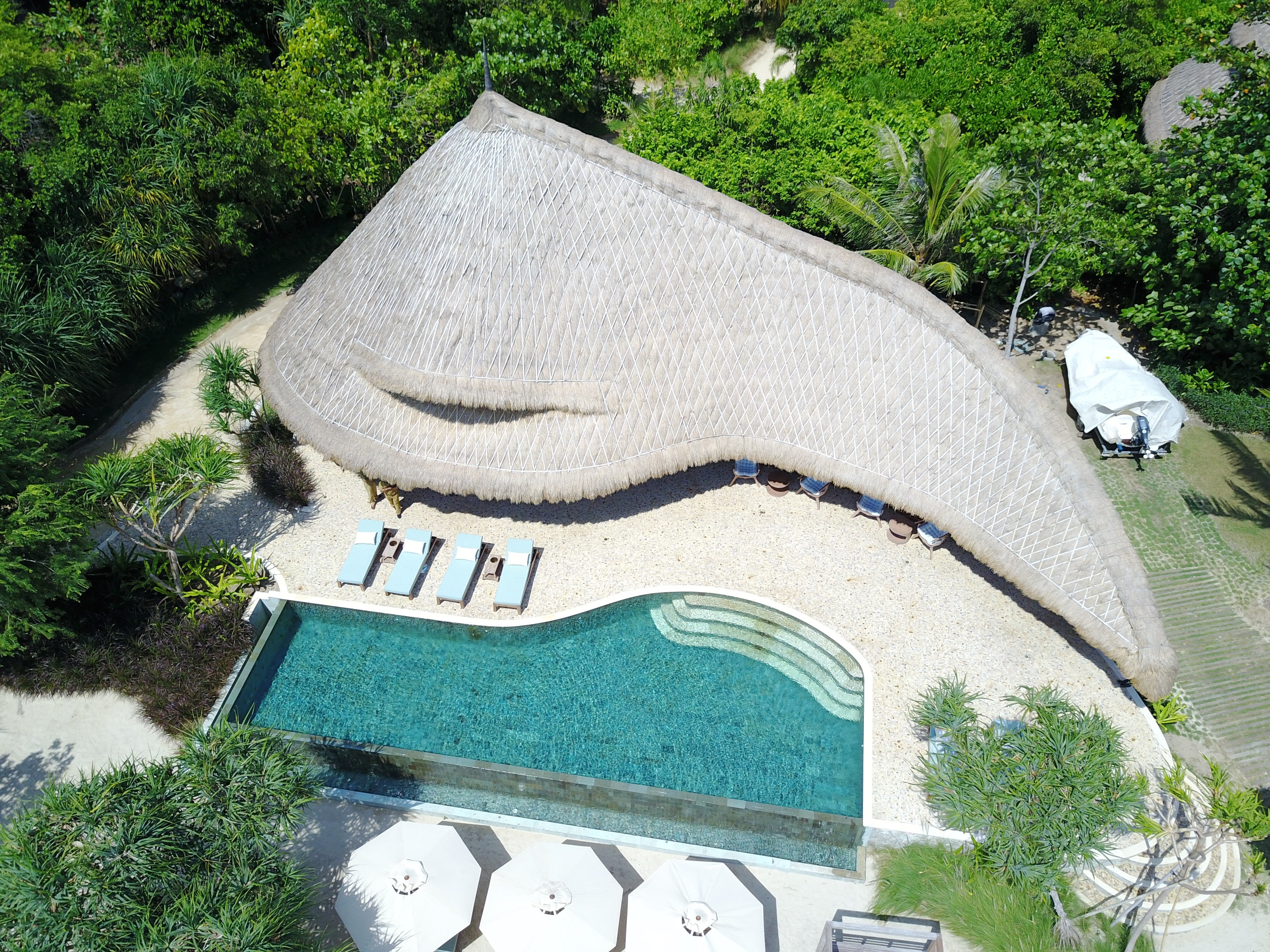 Seafront villas that resemble giant boomerangs