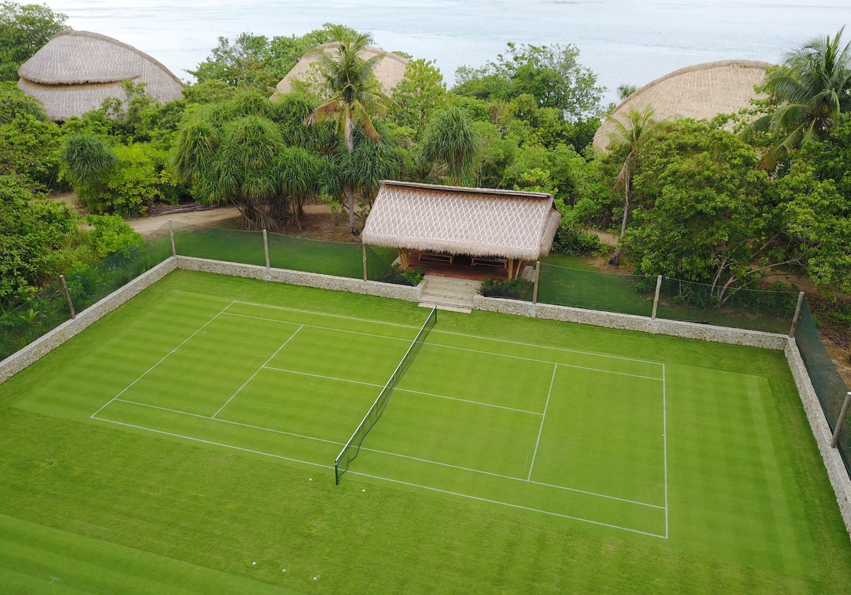 A grass court epitomises barefoot luxury