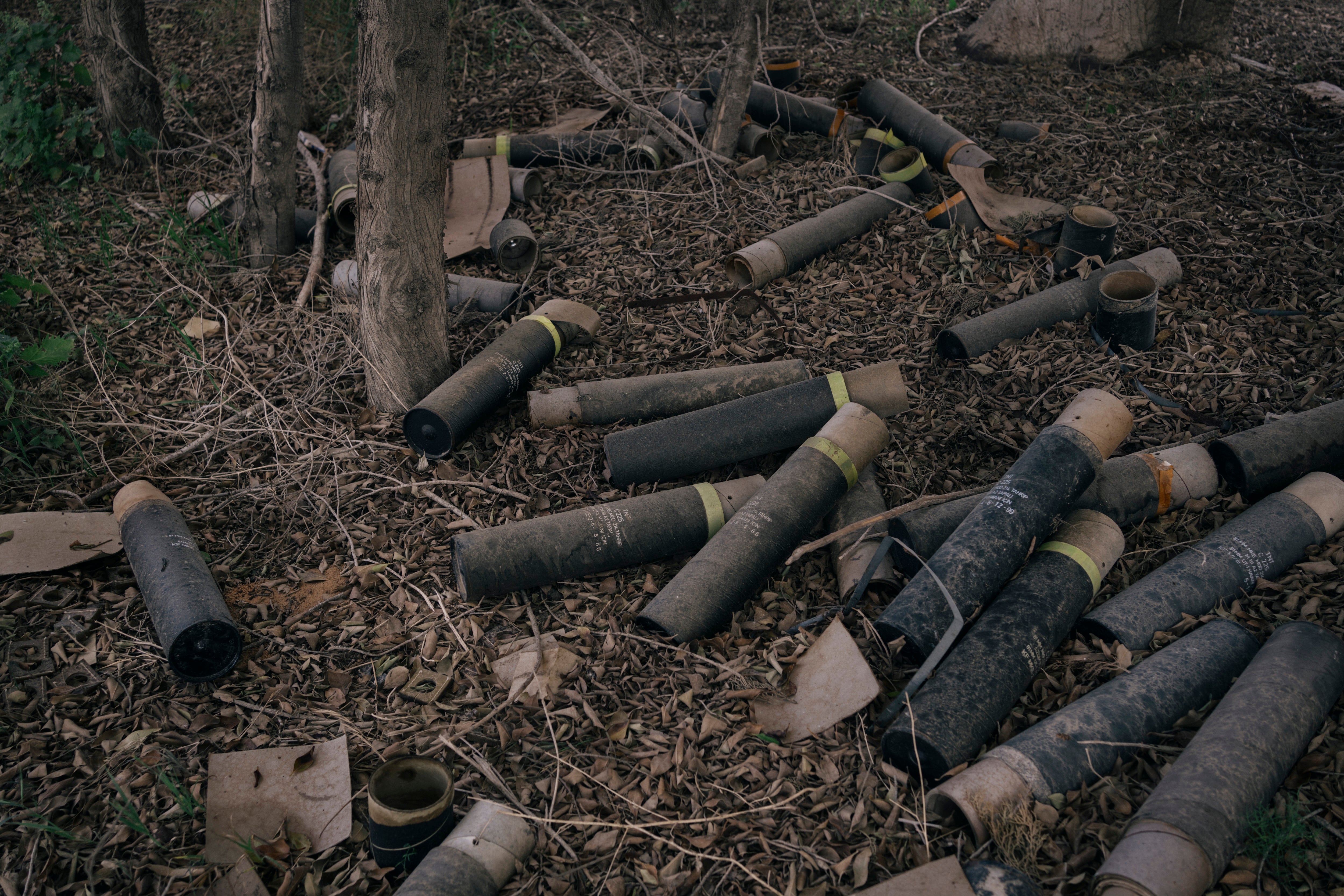 Mortar shell packaging litters the side of the road at a farm in the suburbs of Tripoli. A militia was using this position to launch mortar rounds