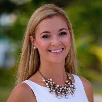 Jasmine Hartin, pictured in her LinkedIn photo, worked for her husband’s hotel, The Alaia, in Belize