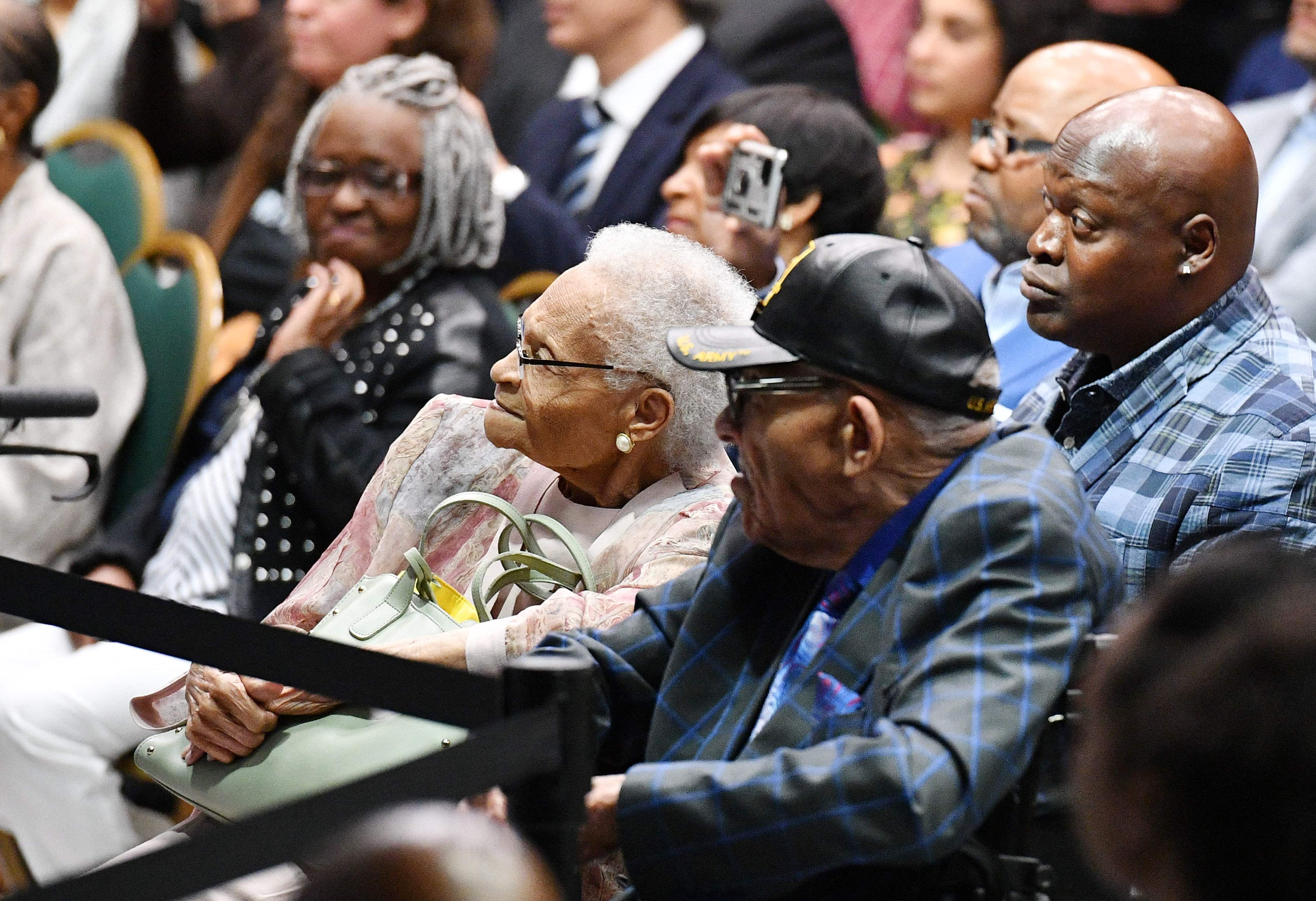 Violet “Mother” Fletcher and Hughes “Uncle Red” Van Ellis, two of three known living survivors of the 1921 Tulsa race massacre, listen to Joe Biden speak on 1 June.