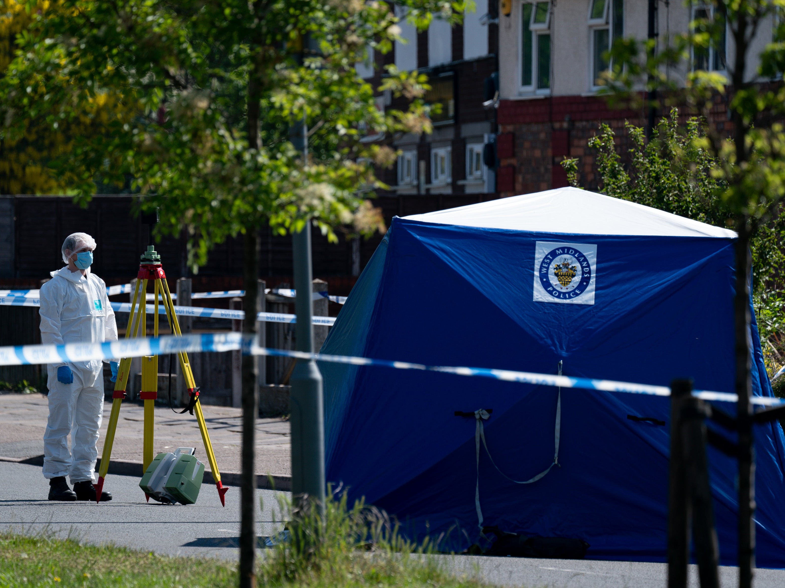 Forensics officers were working on Tuesday at the scene of the stabbing on College Road, Kingstanding, north of Birmingham