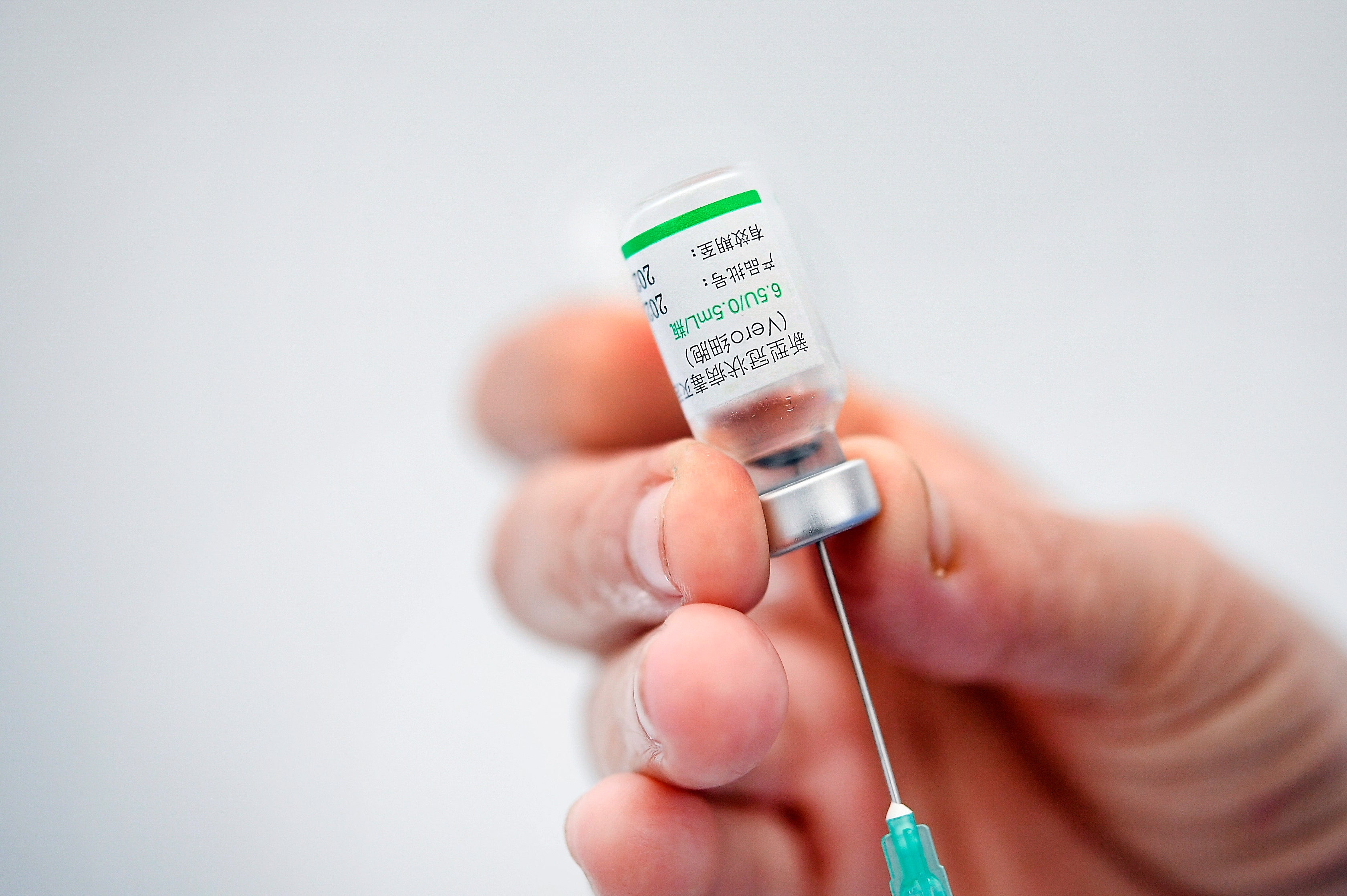 A healthcare worker prepares a dose of the Sinovac vaccine in Caracas, Venezuela, on 28 May, 2021.