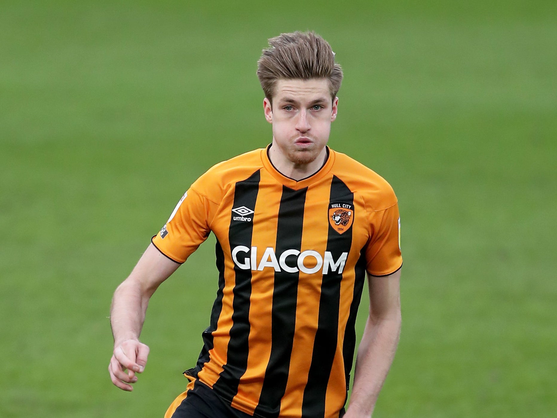 Hull defender Reece Burke will join Luton when his contract expires at the end of the month