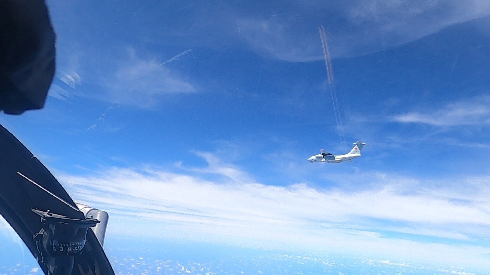 A plane with a Chinese flag on its tail is seen in this handout picture from the Royal Malaysian Air Force