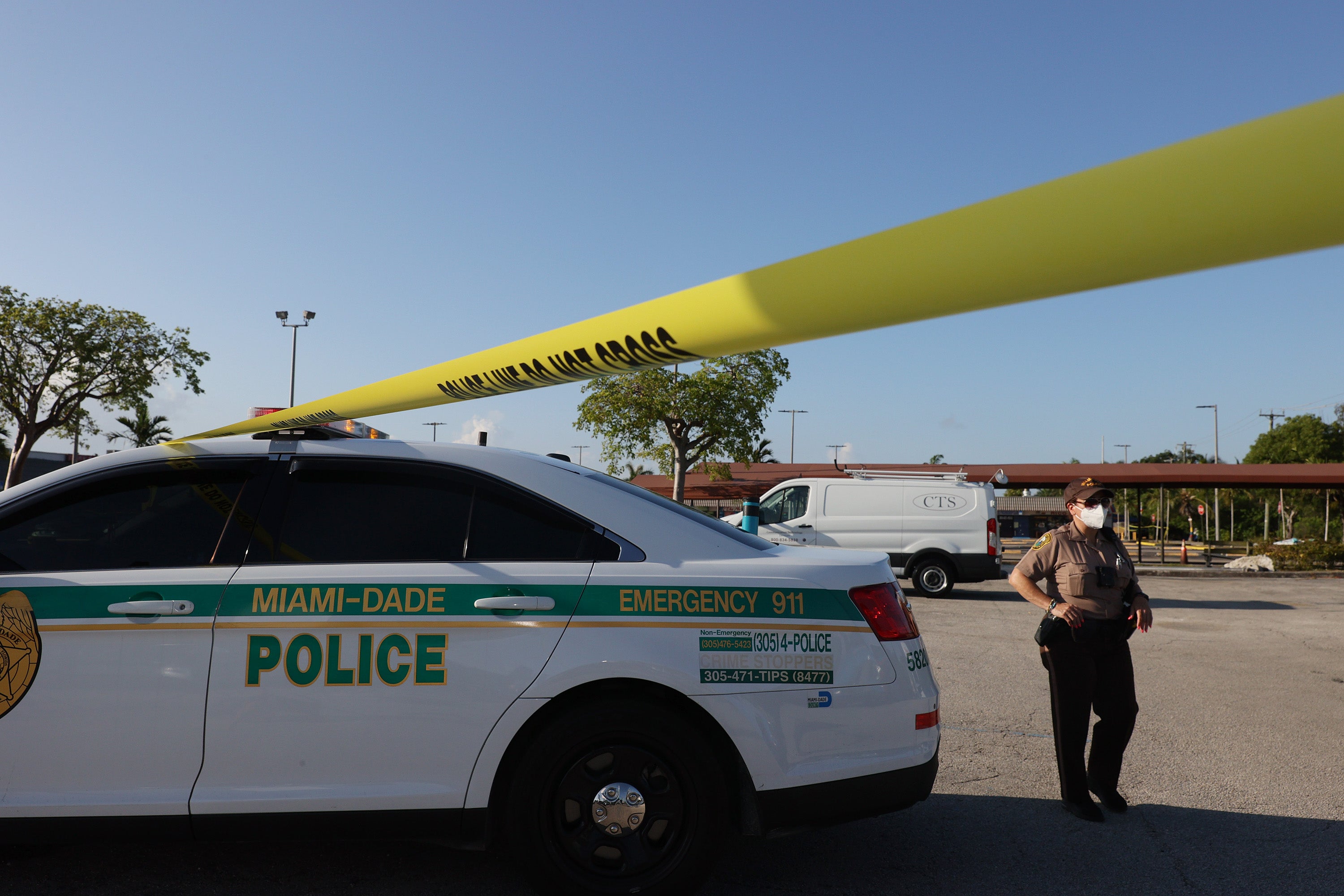 Witnesses said the man and his son were wearing ski masks and hoodies as paintballs peppered a crowd of people, including children, at a home in Opa-locka, Florida