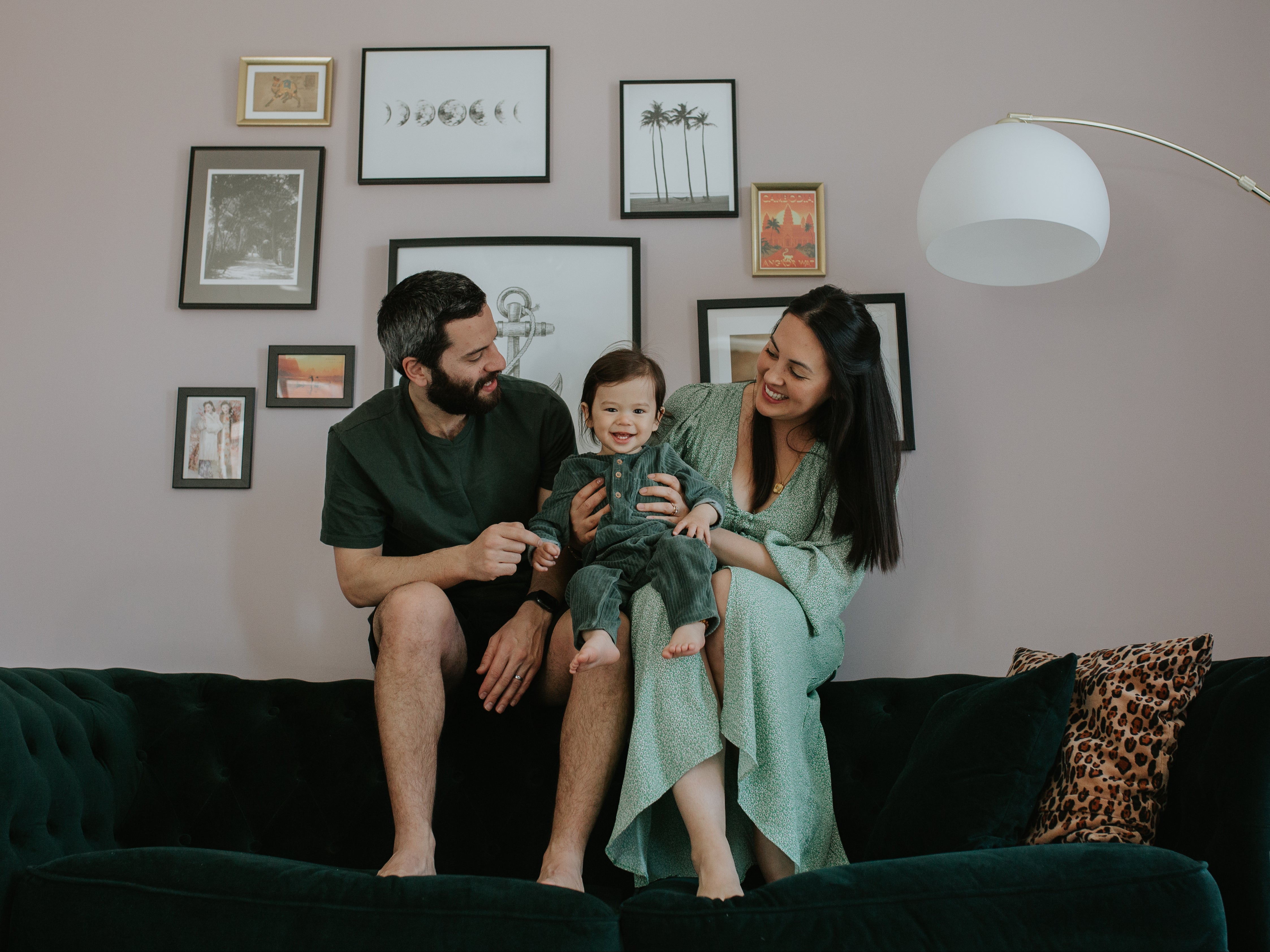 Yumi Palmer (R), with her family, in the townhouse they are raffling off for £3