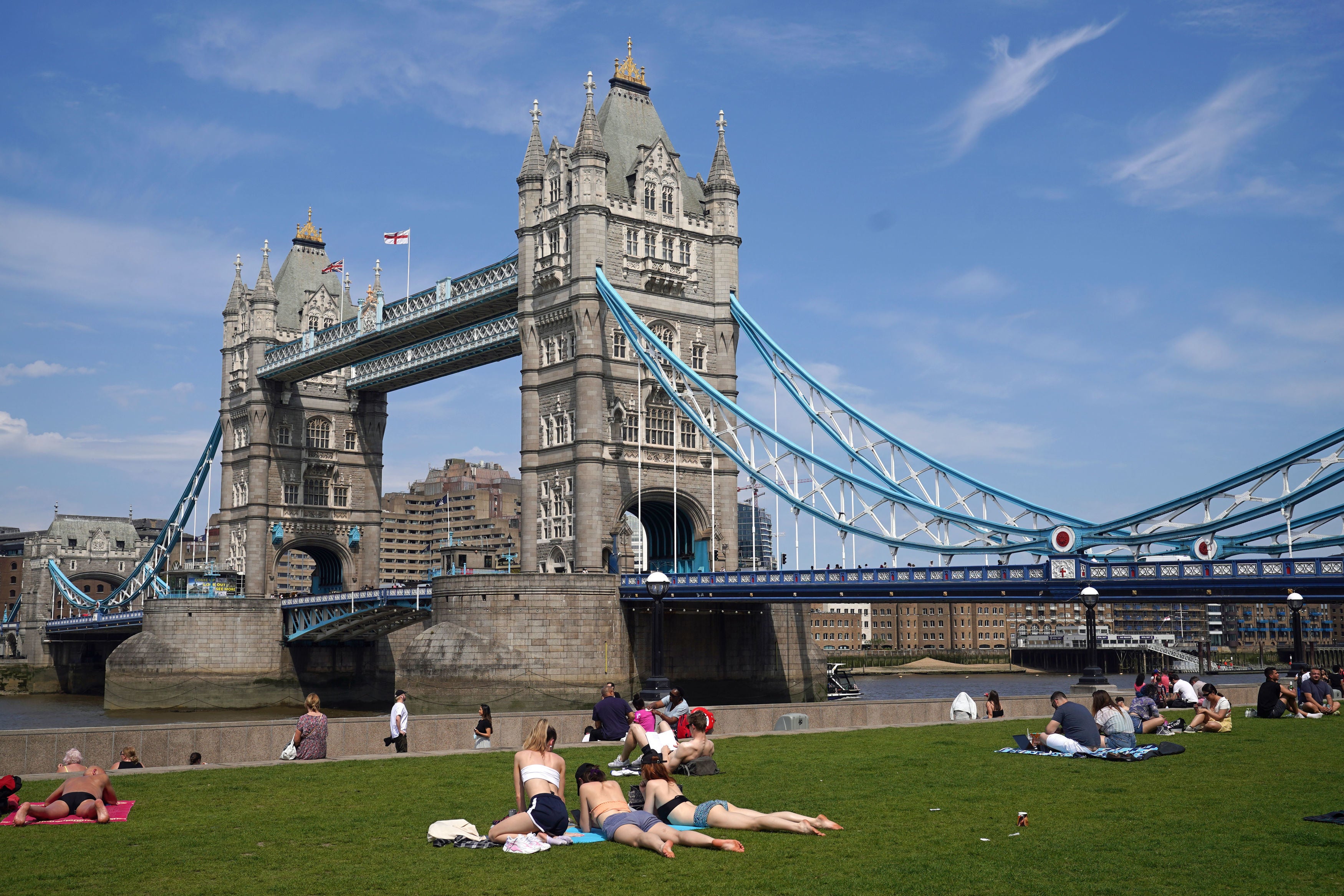 People enjoying the hot weather in Potters Fields, London