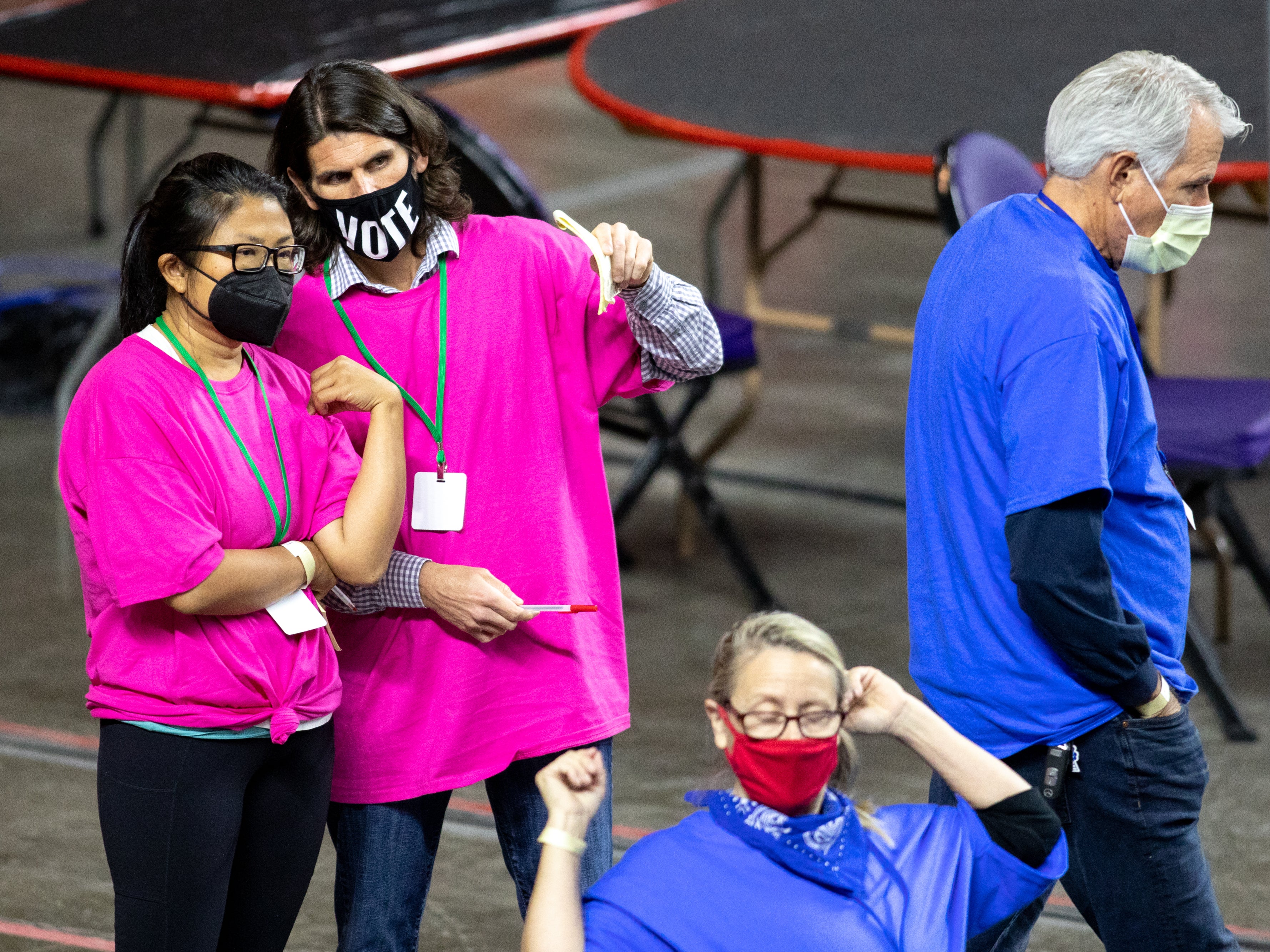 Ballots from the 2020 general election are being examined and recounted at Veterans Memorial Coliseum on May 1, 2021 in Phoenix, Arizona.