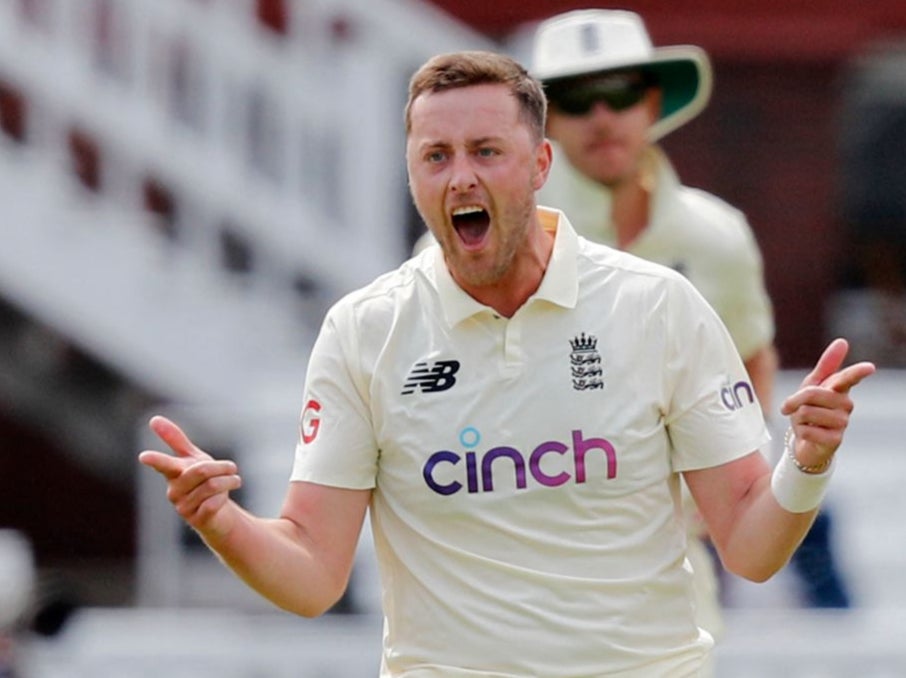 Ollie Robinson celebrates taking the wicket of Ross Taylor