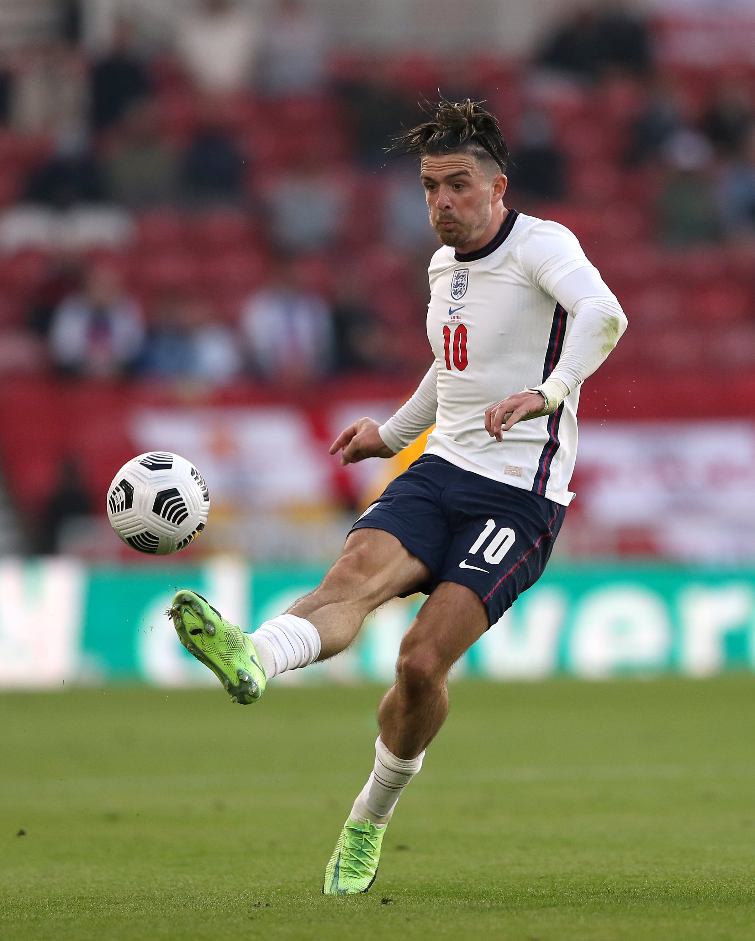 England's Jack Grealish kicks the ball