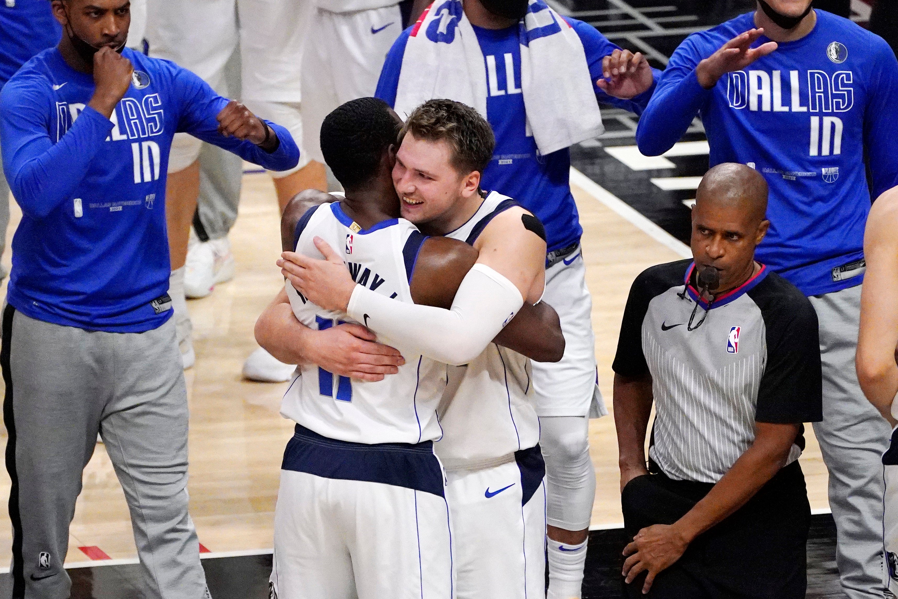 Governor Greg Abbott is expected to sign a law requiring sports teams, like the Dallas Mavericks, to play the national anthem before games.