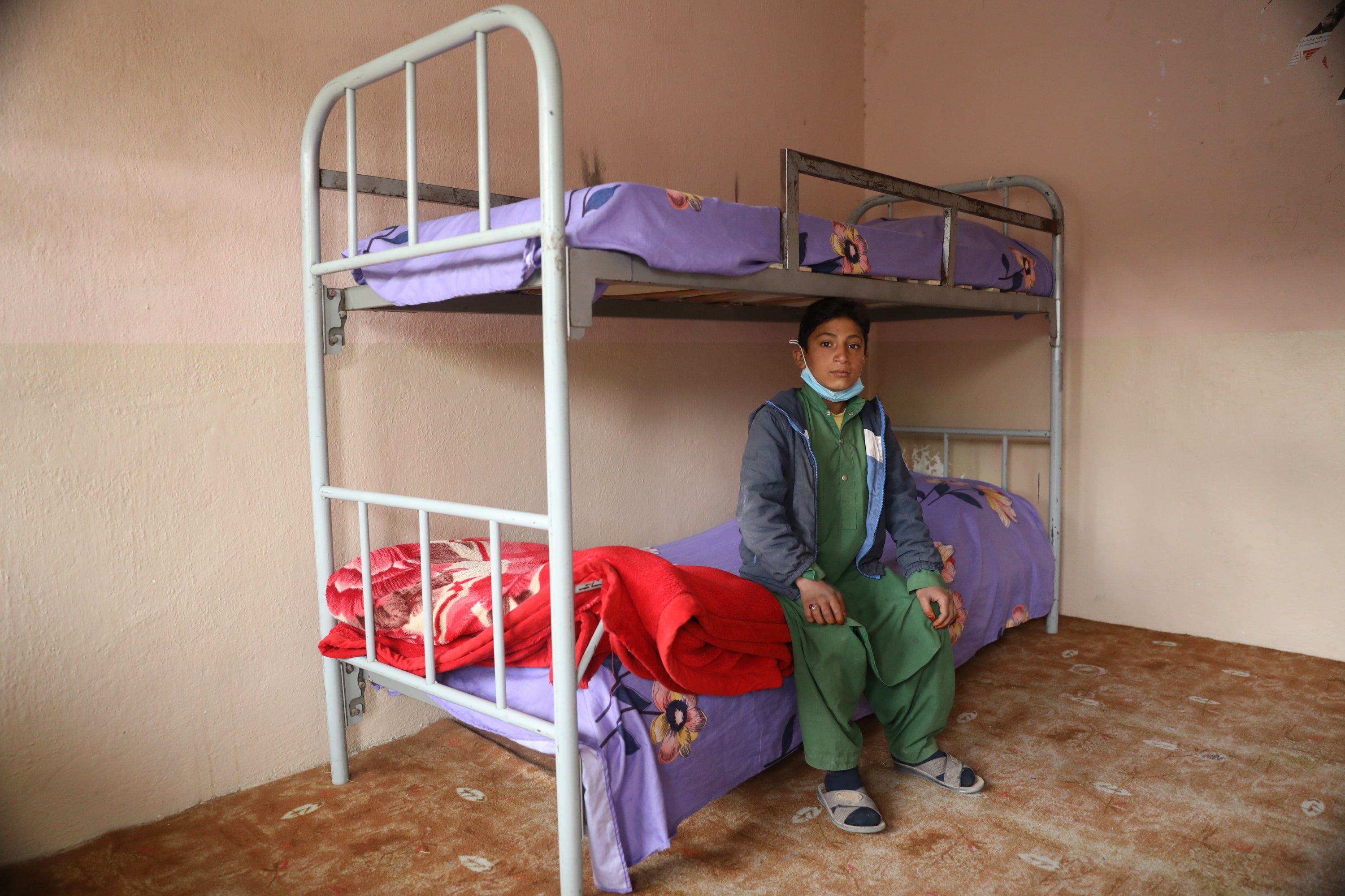 Jawad, 11, with his mother Amina and the PSS worker Amina at War Child UK's GTC in Herat