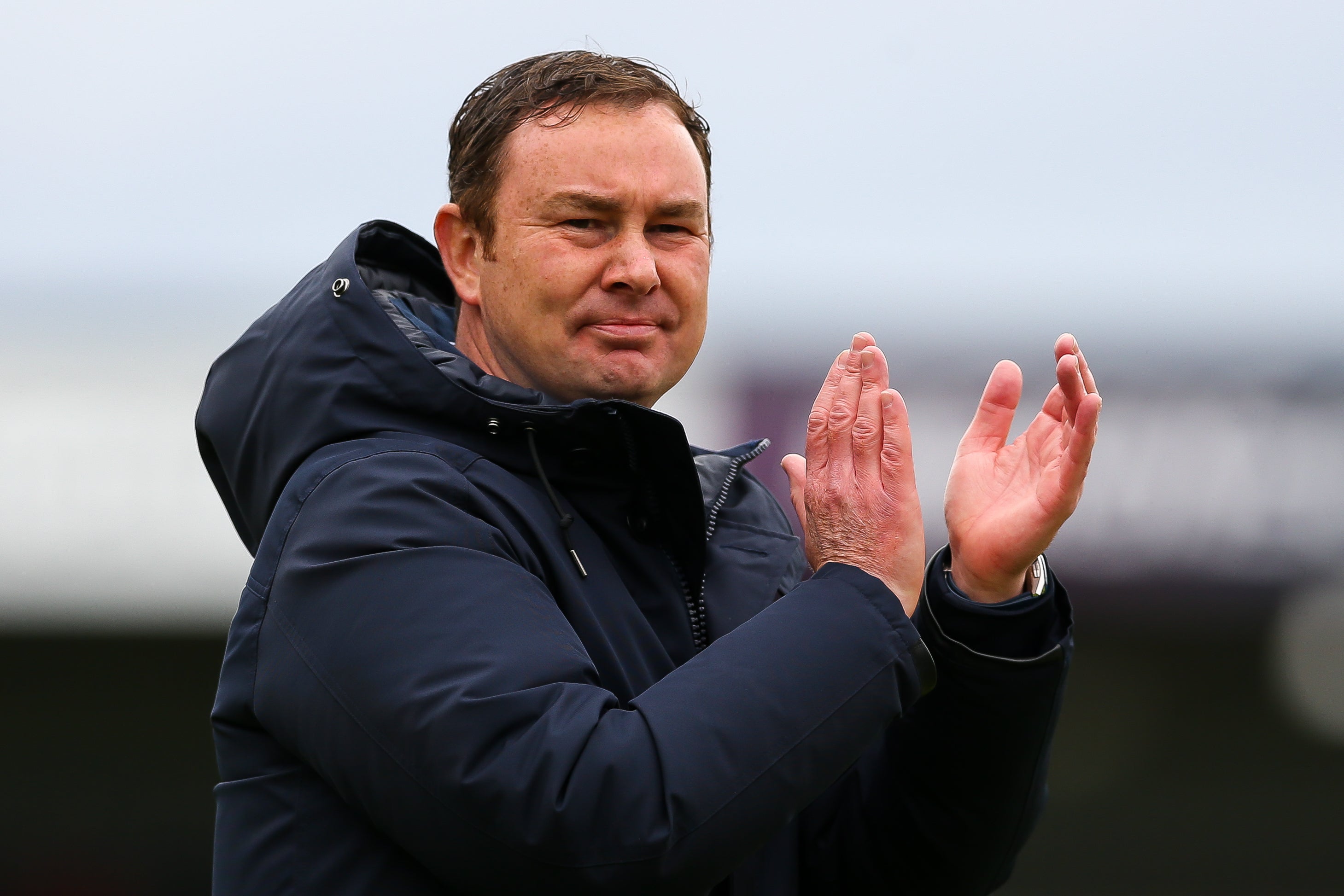 Derek Adams applauds on the touchline