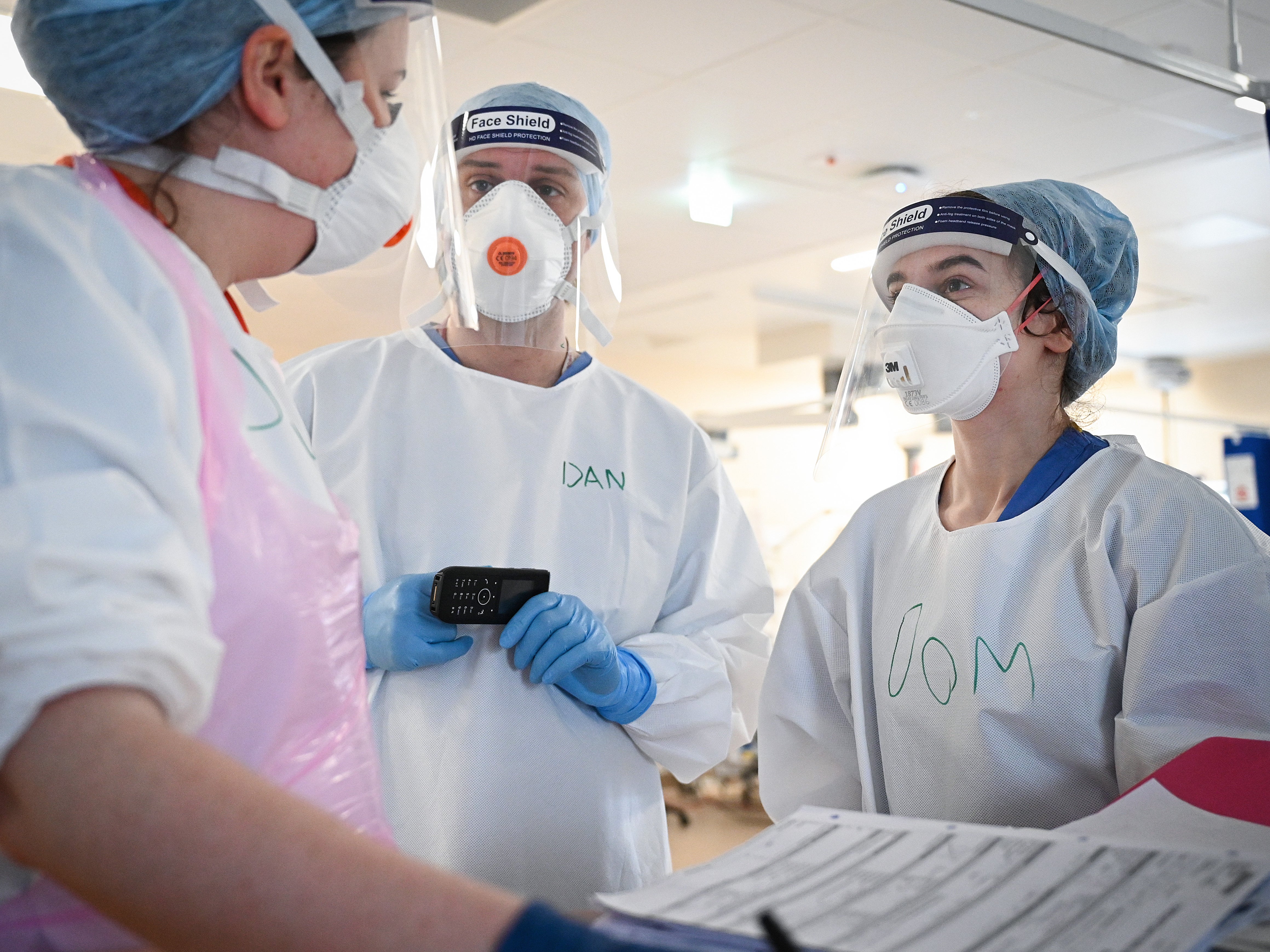 Staff at University Hospital Monklands attend to Covid-positive patients in the ICU ward in Airdrie, Scotland