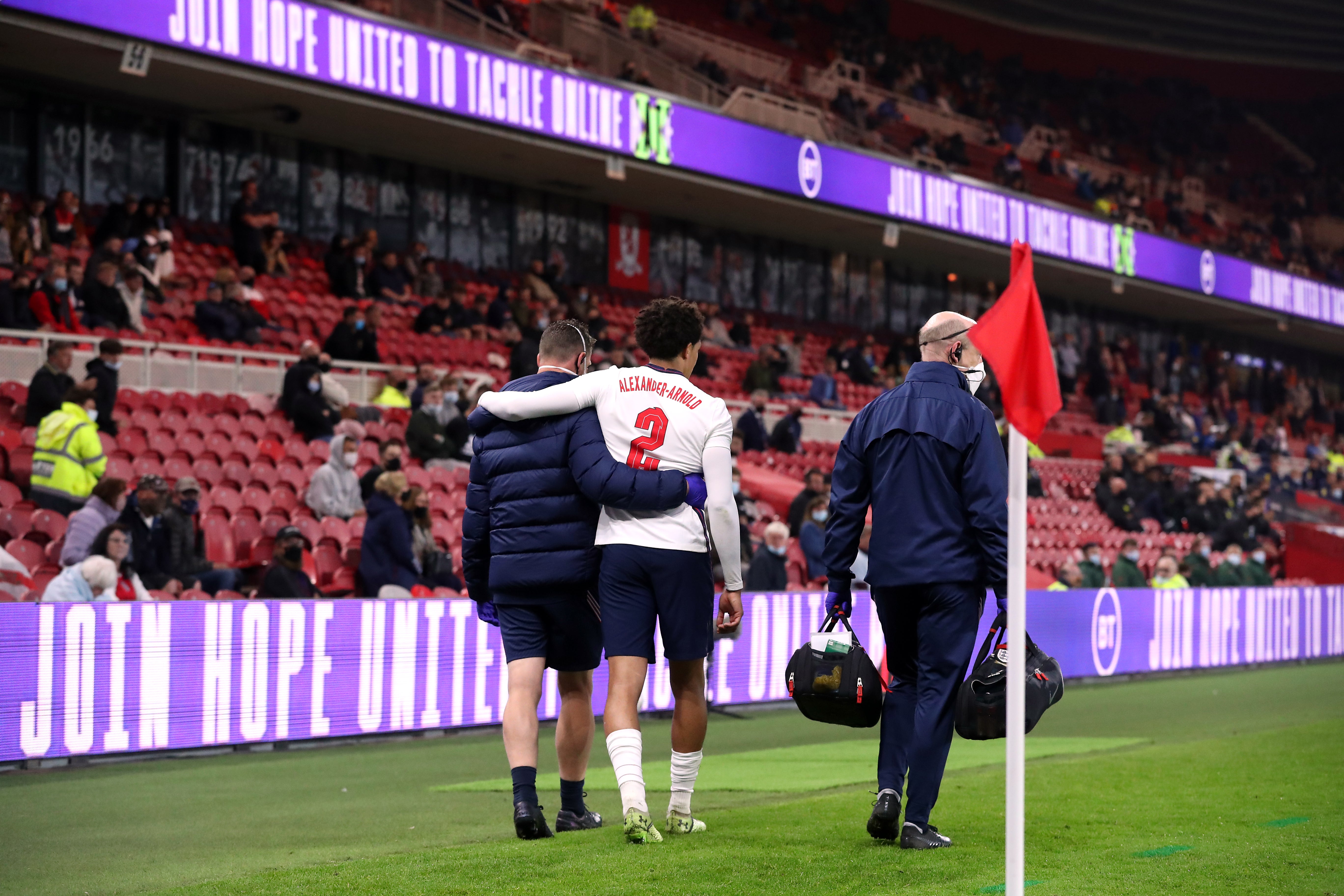 England’s Trent Alexander-Arnold is helped down the touchline