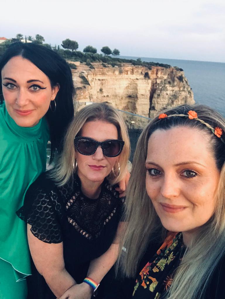 Dayna Brackley (right) and Katy Daly (centre), currently on holiday in Portugal, will need to self-isolate for 10 days on return to the UK