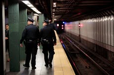 Woman dies after being pushed in front of subway train at New York’s Times Square