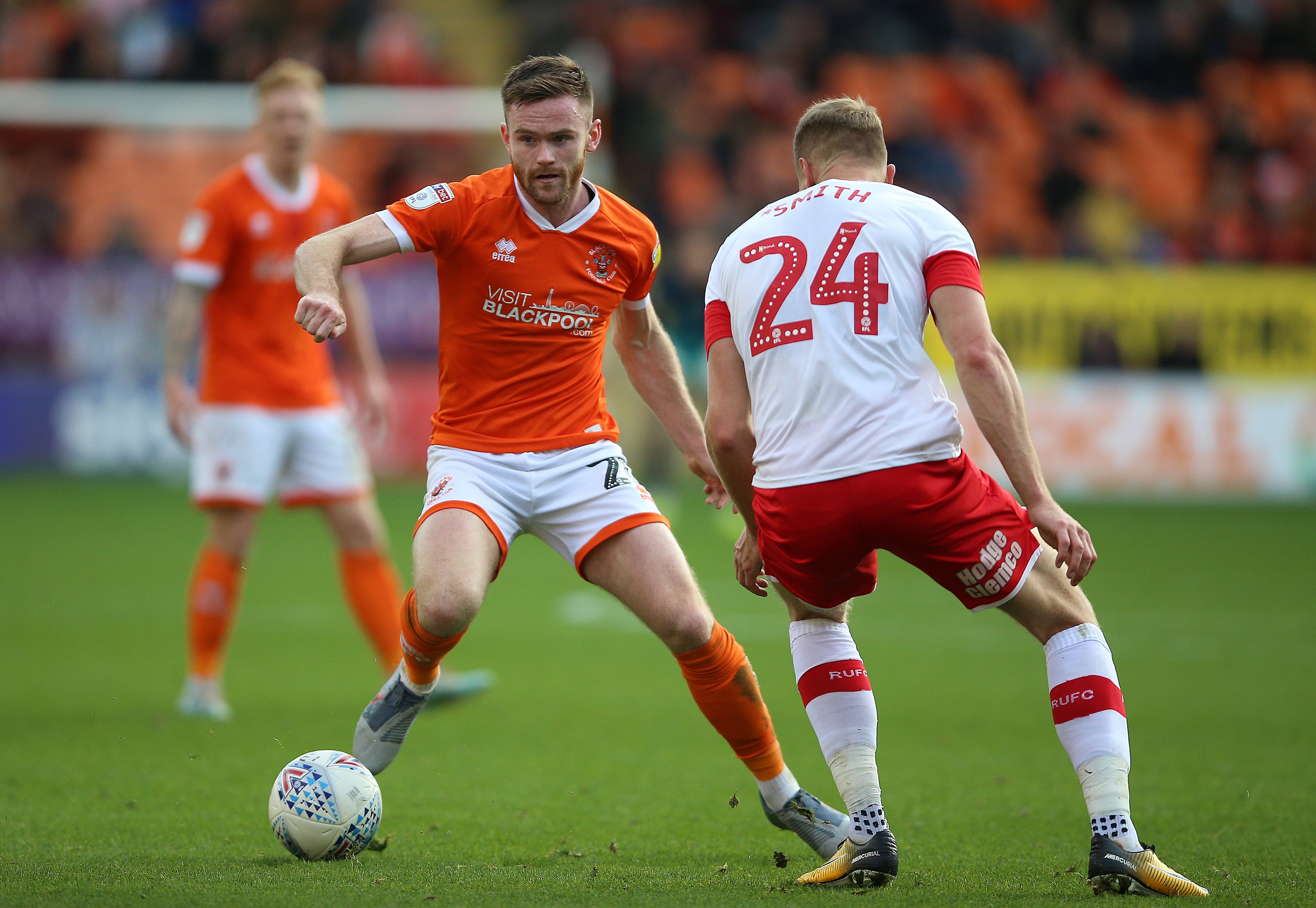 Ollie Turton, left, has joined Huddersfield