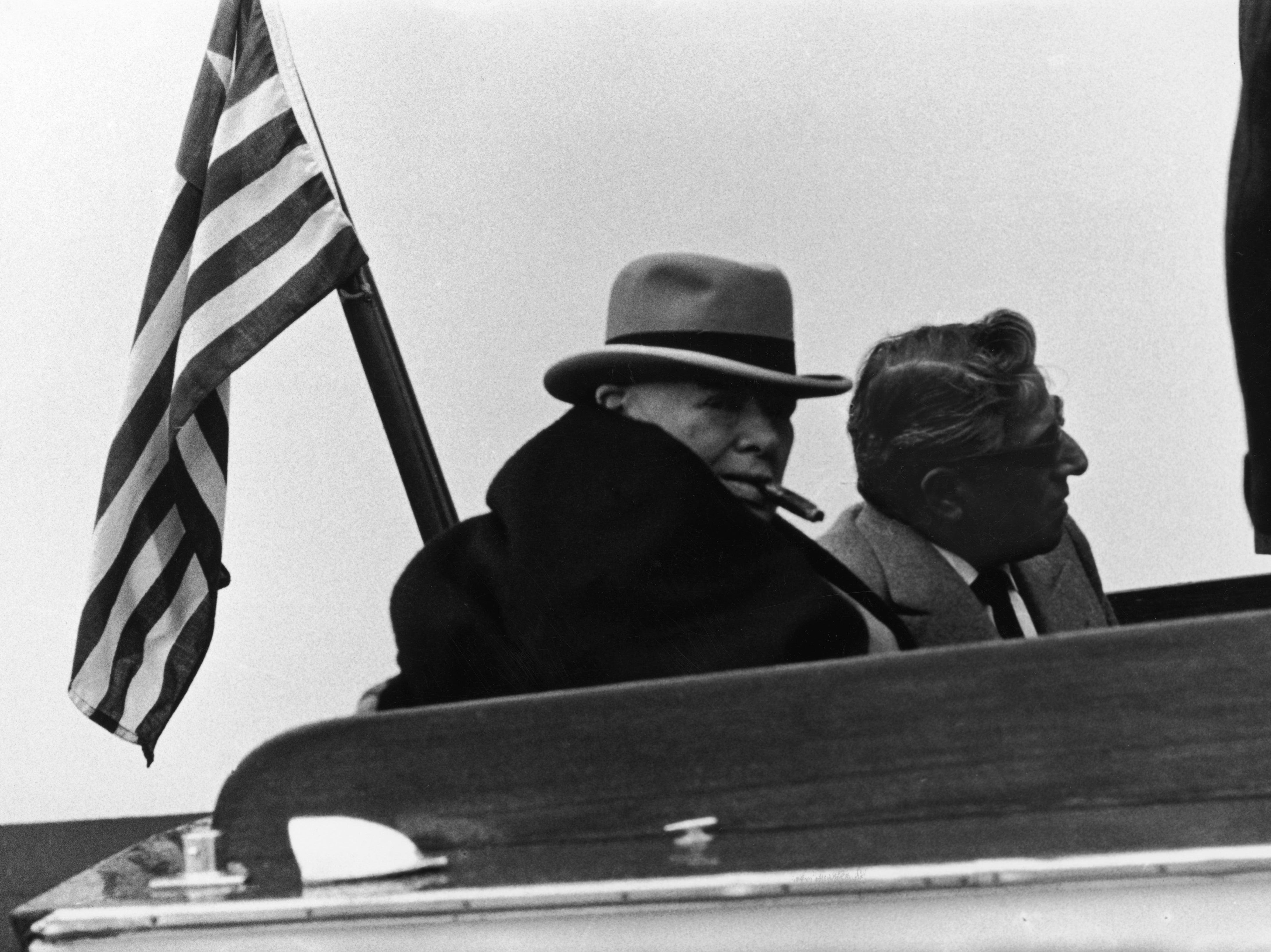 Shipping magnate Aristotle Onassis (1906 - 1975) on board his yacht Christina with guest, former British Prime Minister, Winston Churchill (1874 - 1965), 9th March 1960