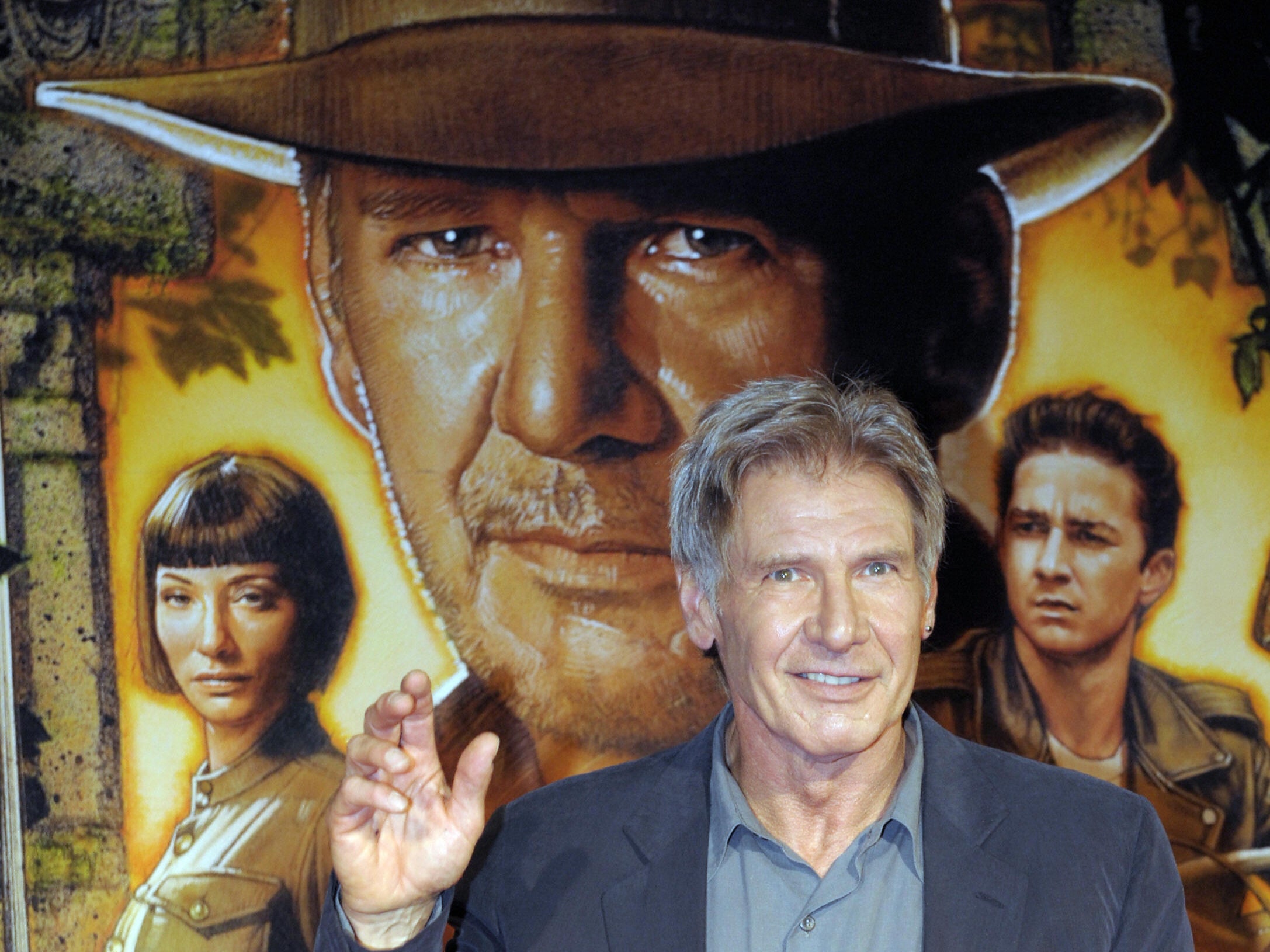 Indiana Jones looms over Harrison Ford at the Japanese premiere of ‘Indiana Jones and the Kingdom of the Crystal Skull’ in 2008.