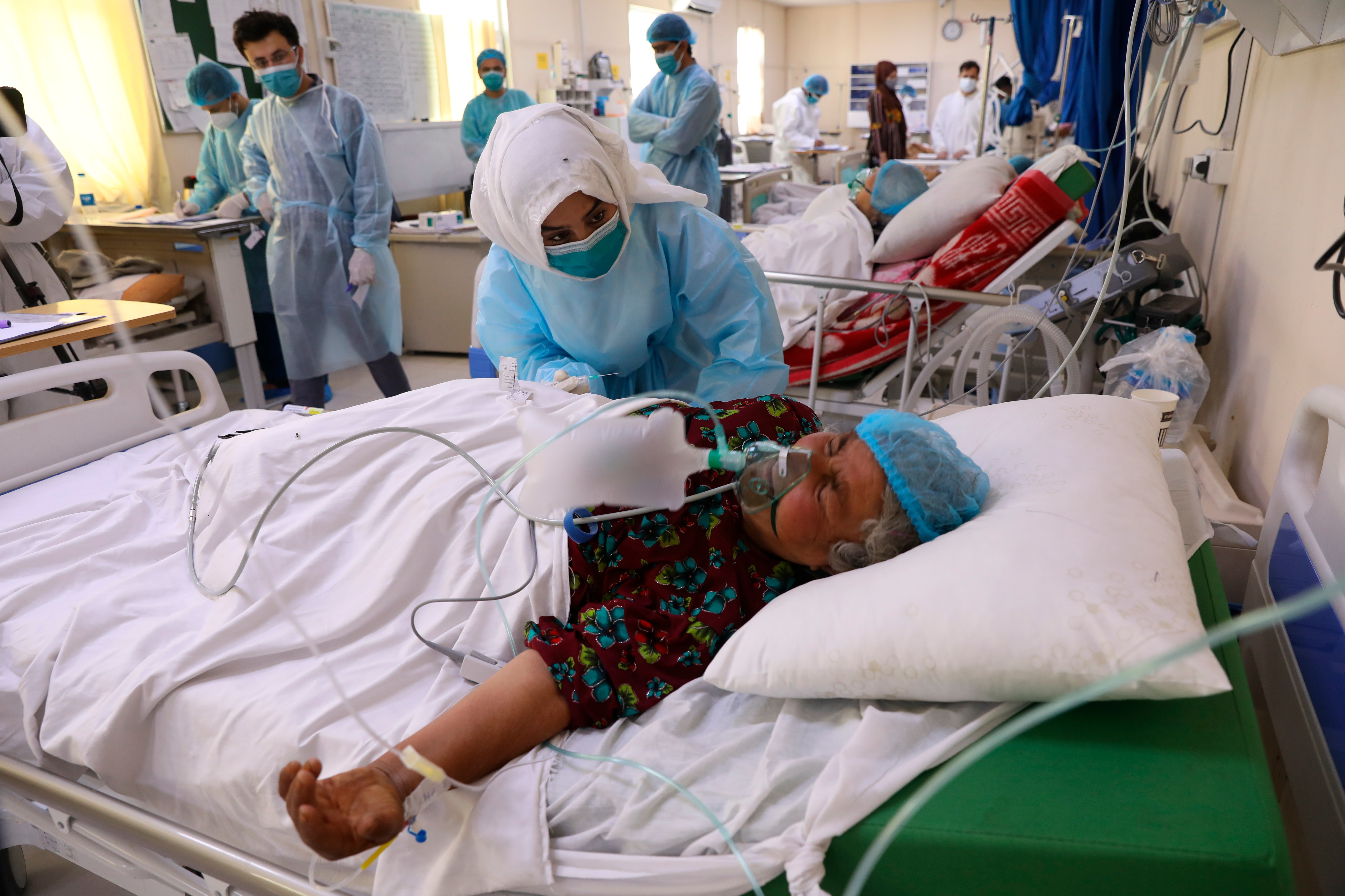 The Latest: UN chief welcomes US vaccine donation to COVAX