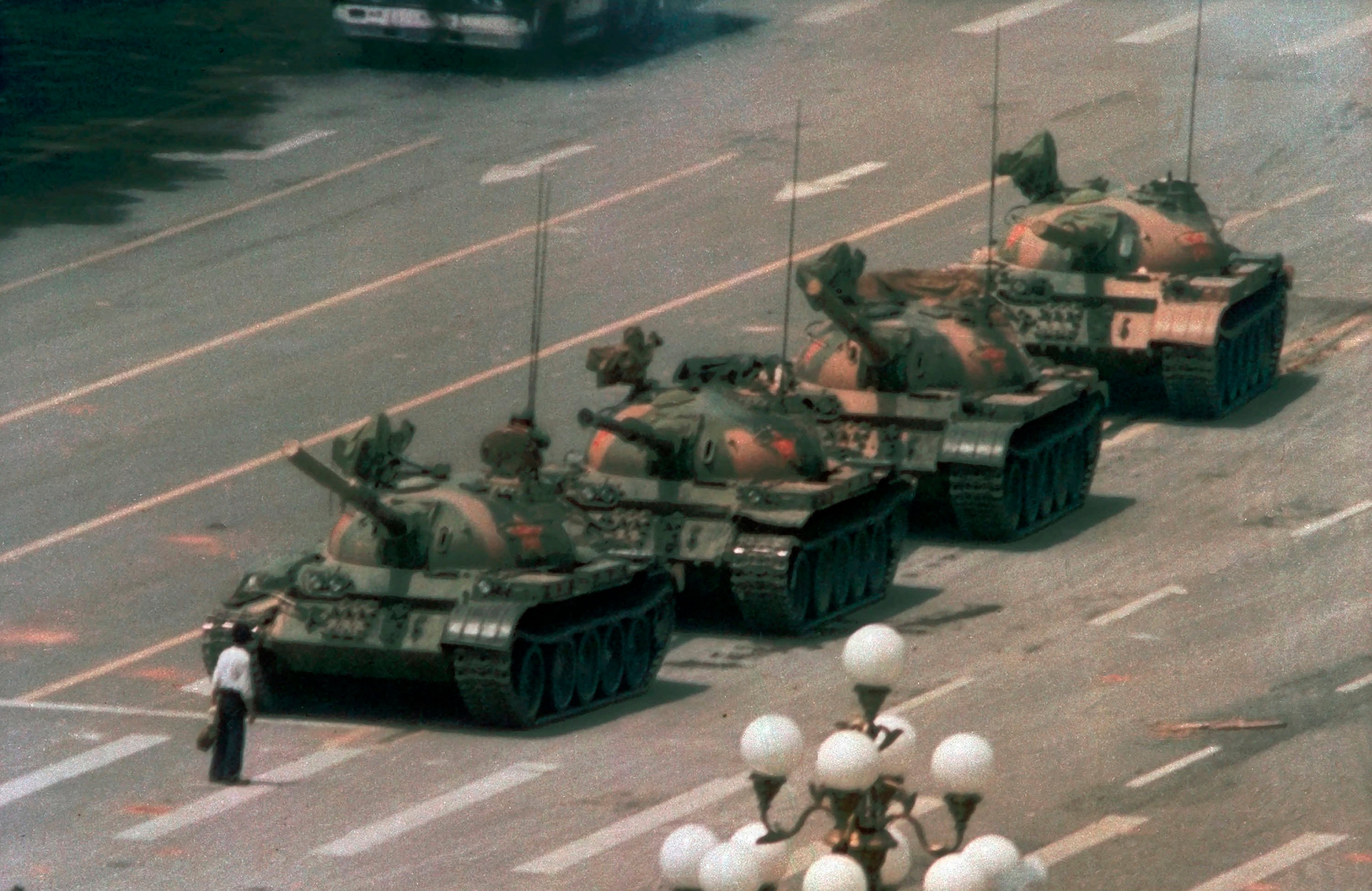 A lone protester stands before tanks during pro-democracy demonstrations in the Beijing city square in June 1989