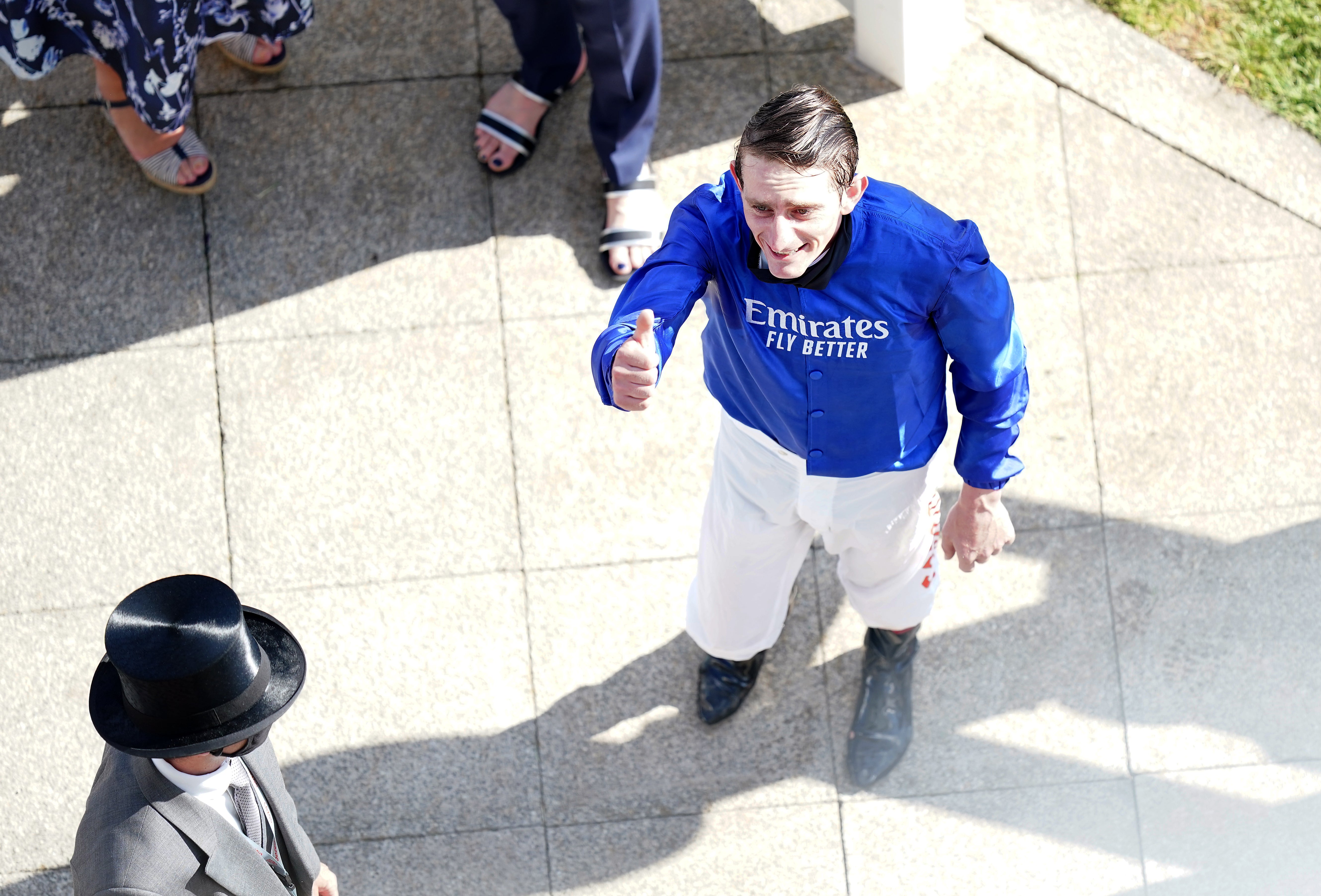 Adam Kirby celebrates at Epsom