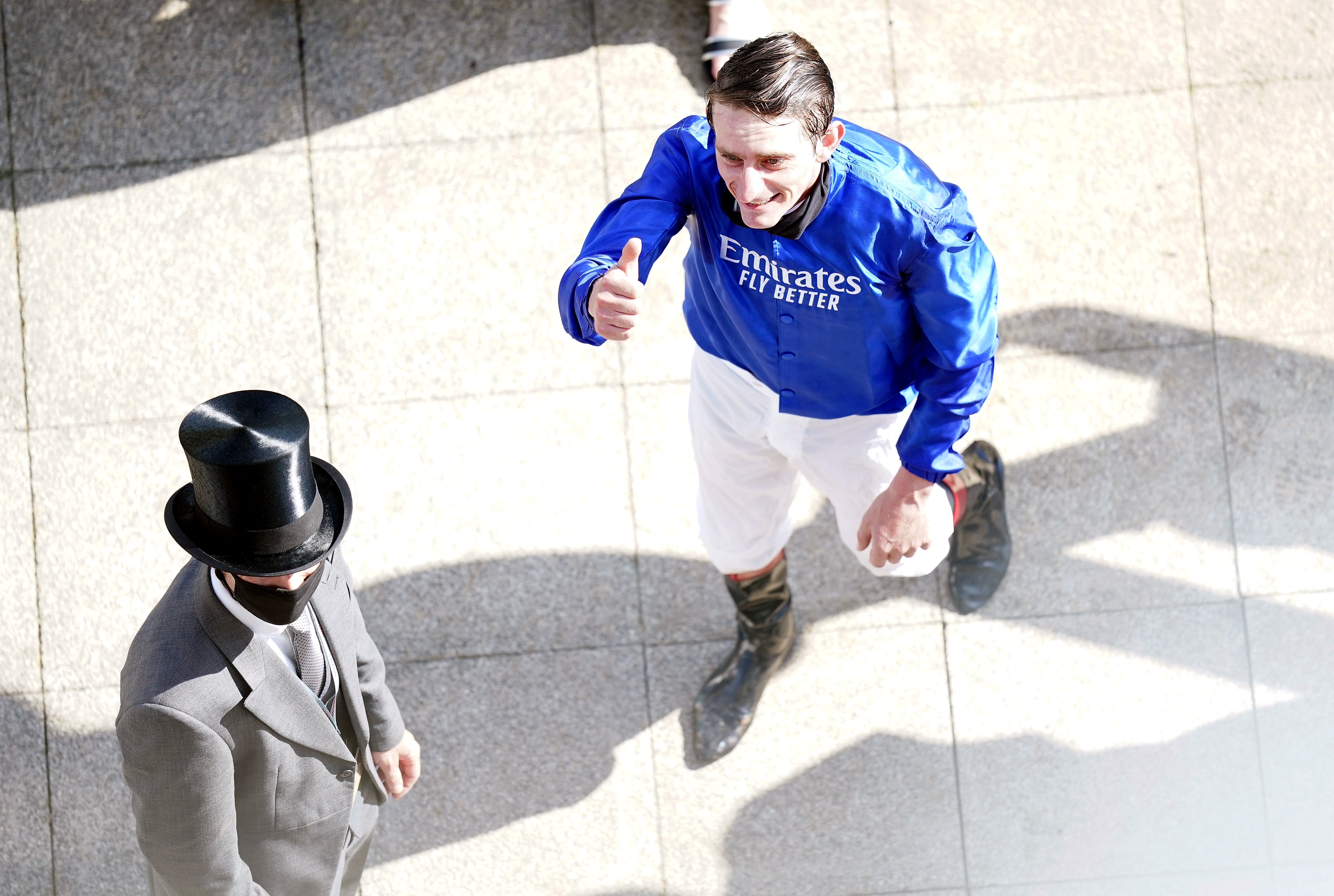 Adam Kirby celebrates at Epsom