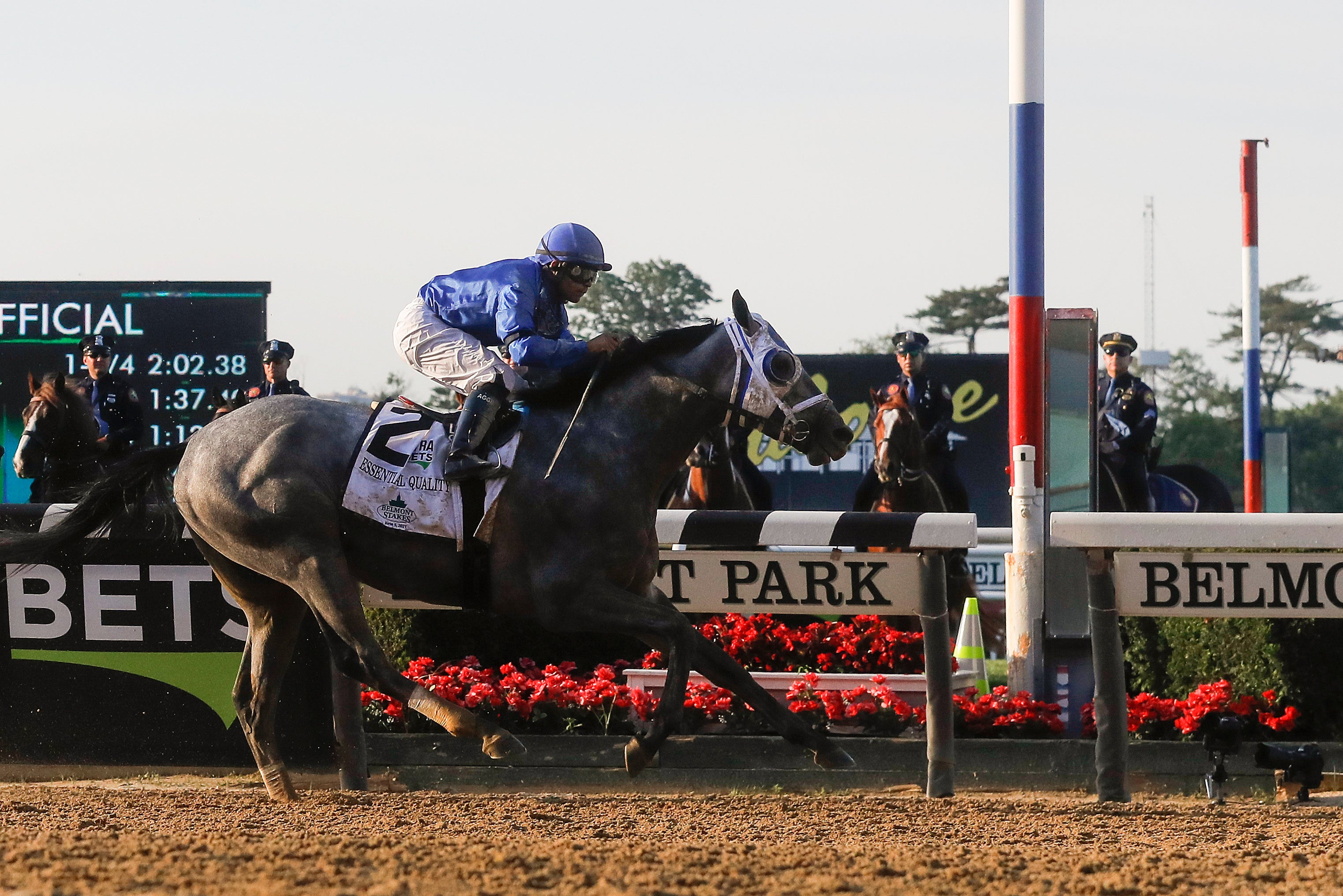 Essential Quality and Luis Saez cross the line for victory in the Belmont Stakes