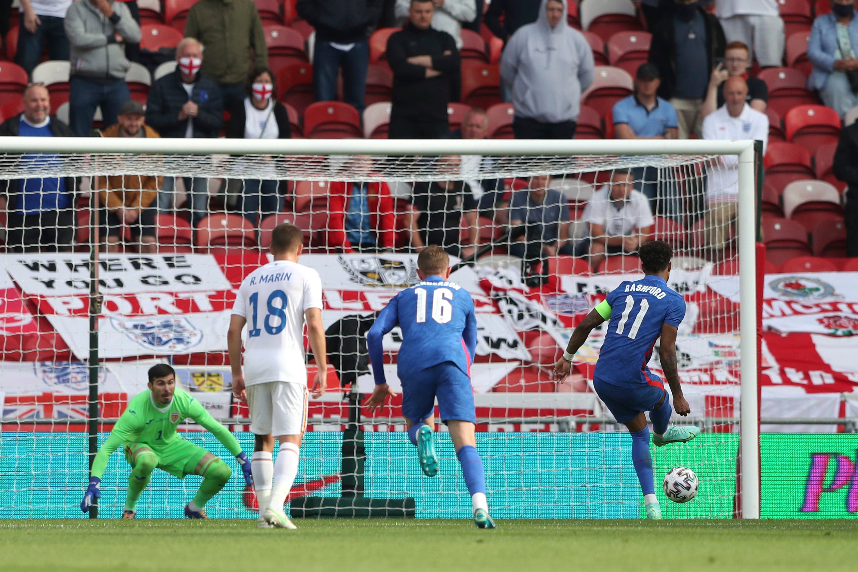 Marcus Rashford slots home from the penalty spot