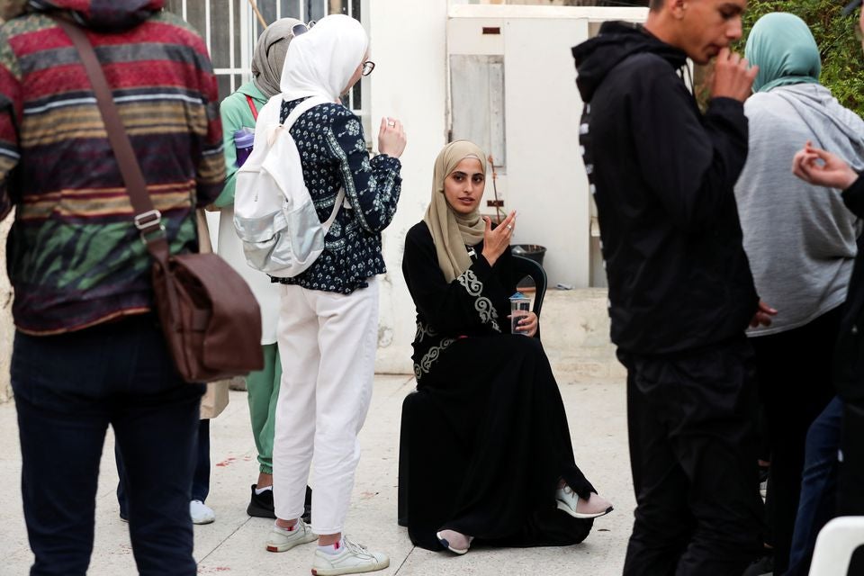 Prominent Palestinian activist Muna El-Kurd sits in the courtyard of her house in the East Jerusalem neighbourhood of Sheikh Jarrah on 6 June