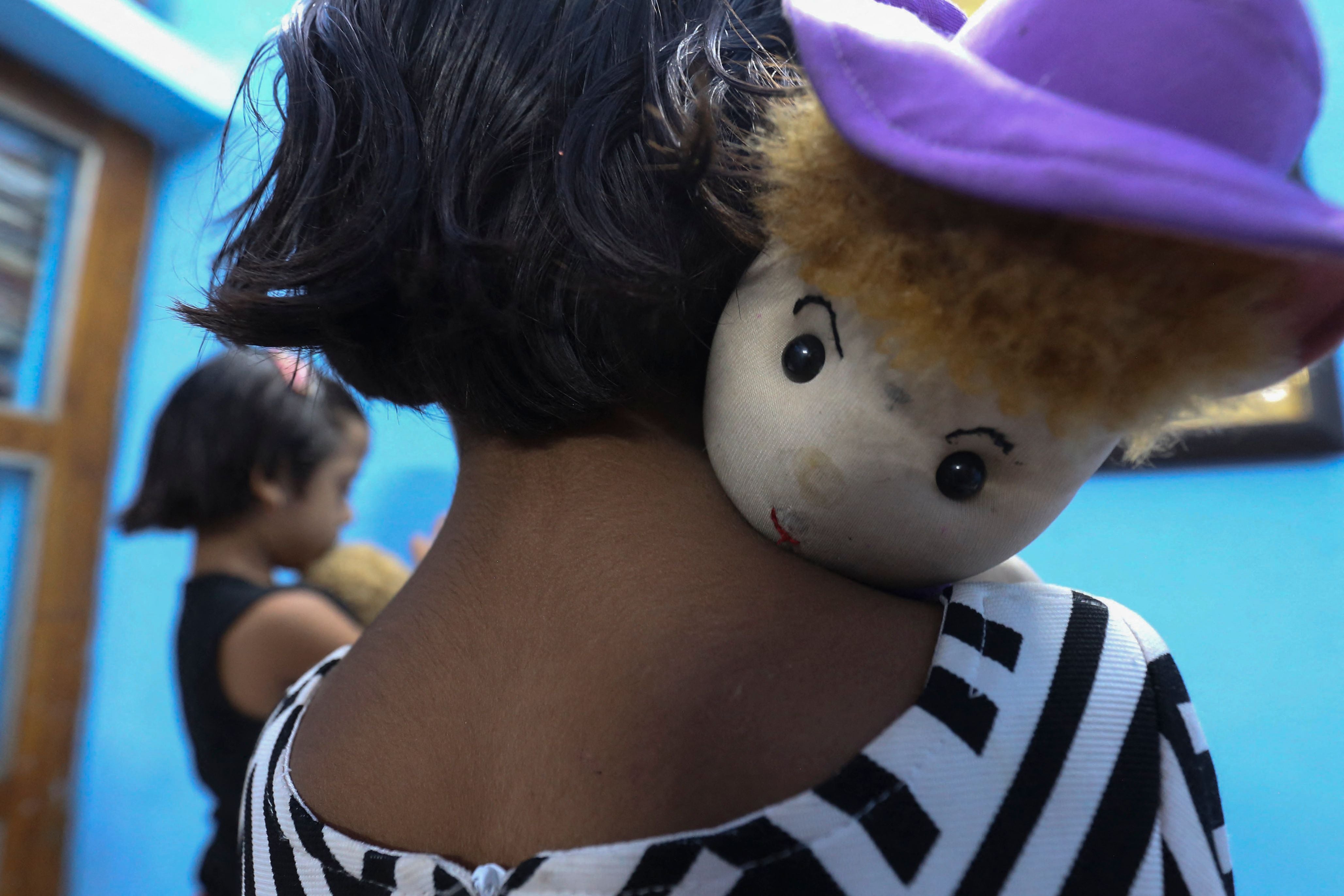 One of the twin sisters Tripti and Pari, who lost both their parents due to the Covid-19 coronavirus in Bhopal, India