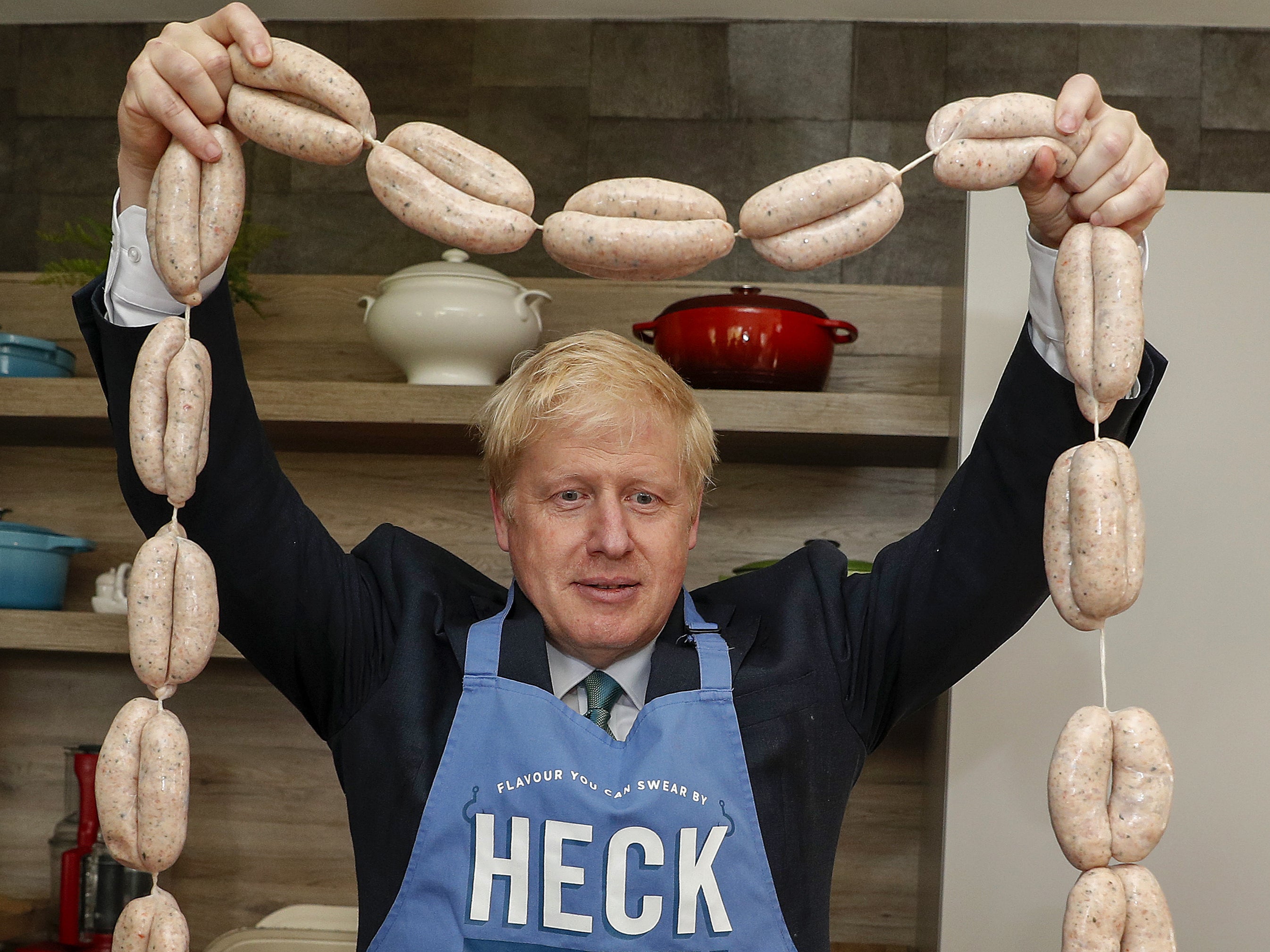 Porkies: Johnson holding aloft a string of ‘Boris bangers’ during his party leadership bid in 2019