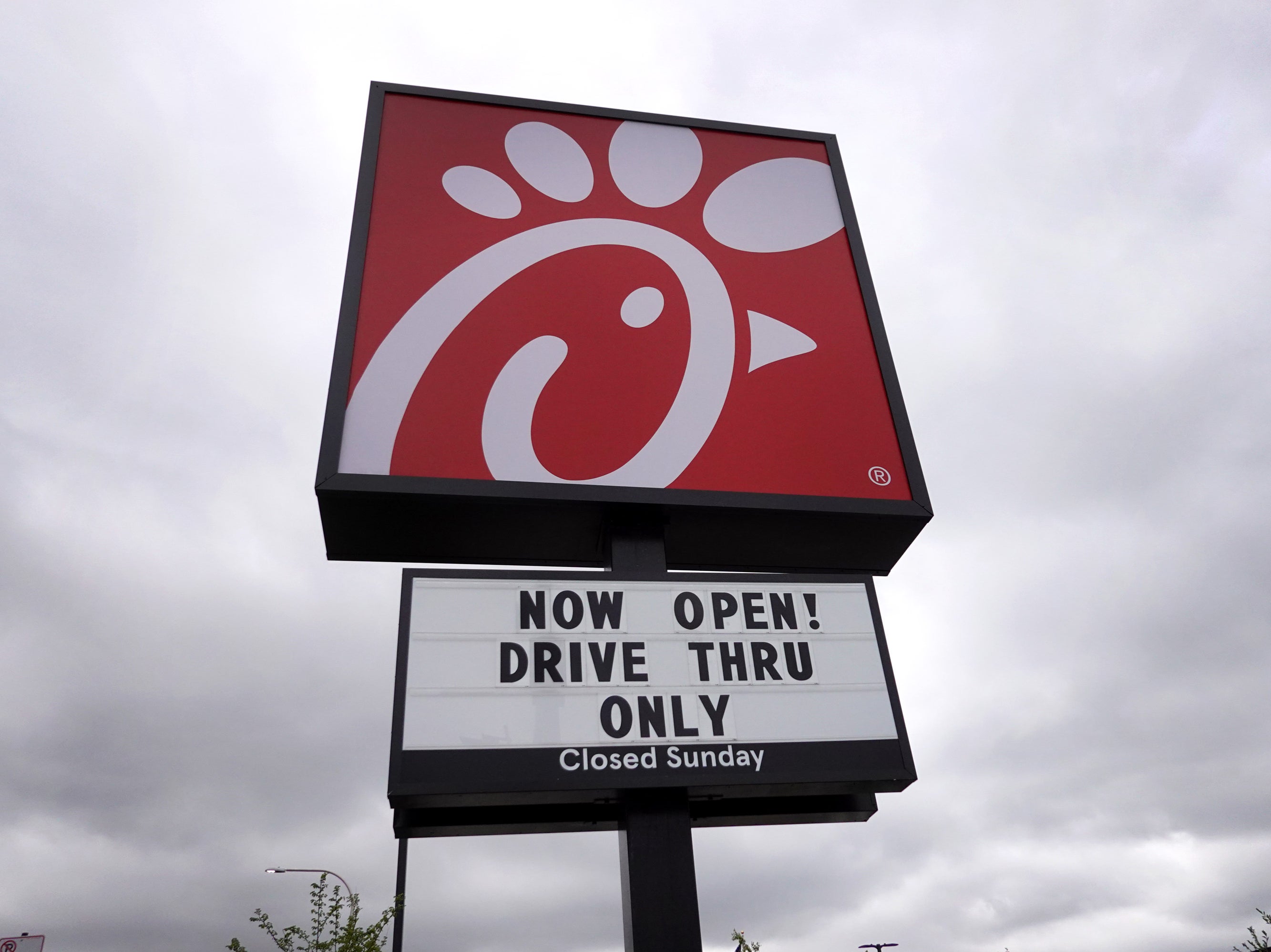 A sign hangs outside of a Chick-fil-A restaurant on 6 May 2021 in Chicago, Illinois