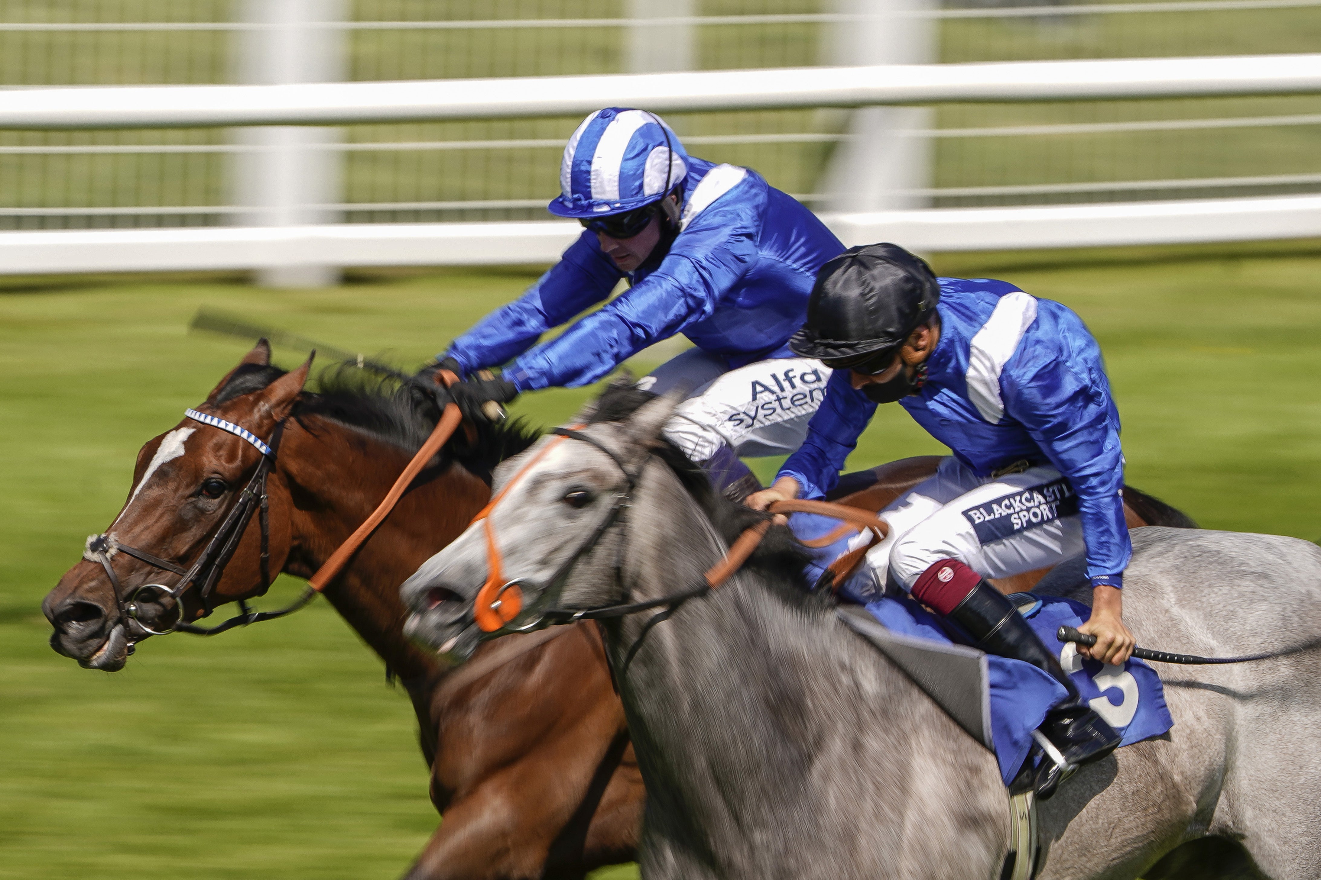 Talbeyah (left) on her way to winning at Salisbury