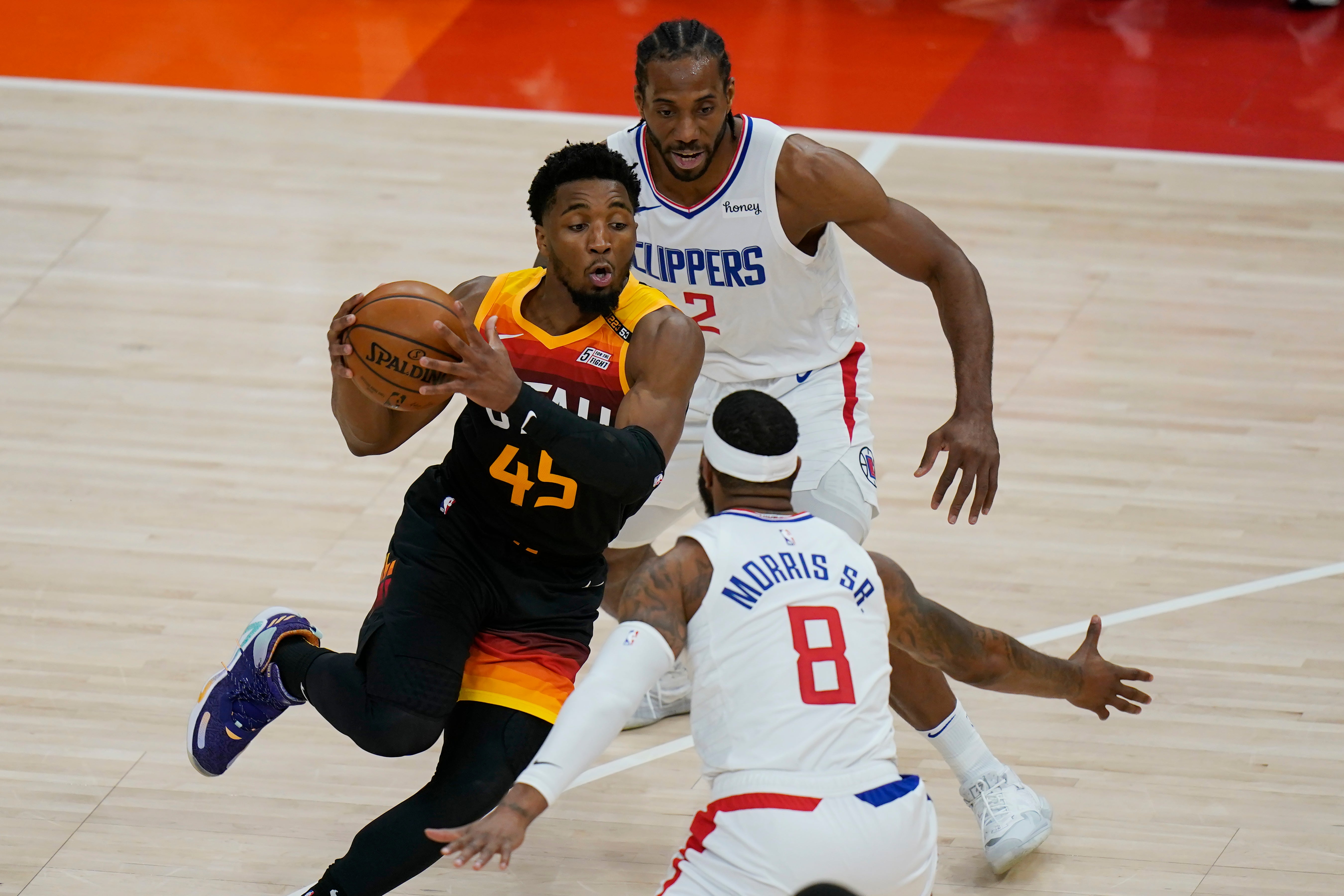 Donovan Mitchell, left, scored 45 points for the Utah Jazz