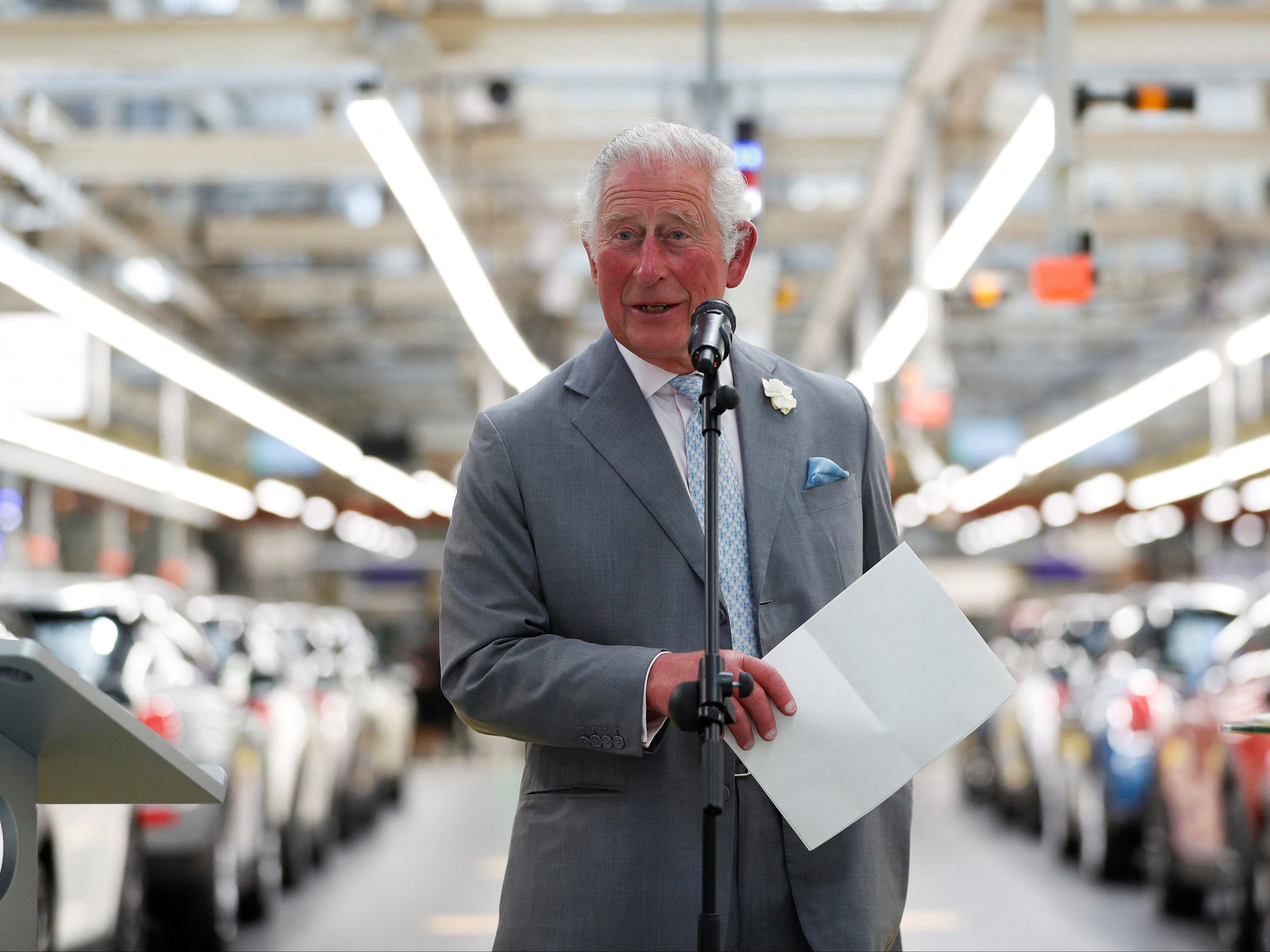 Prince of Wales, makes a speech on th production line to employees during his visit to the MINI plant in Oxford