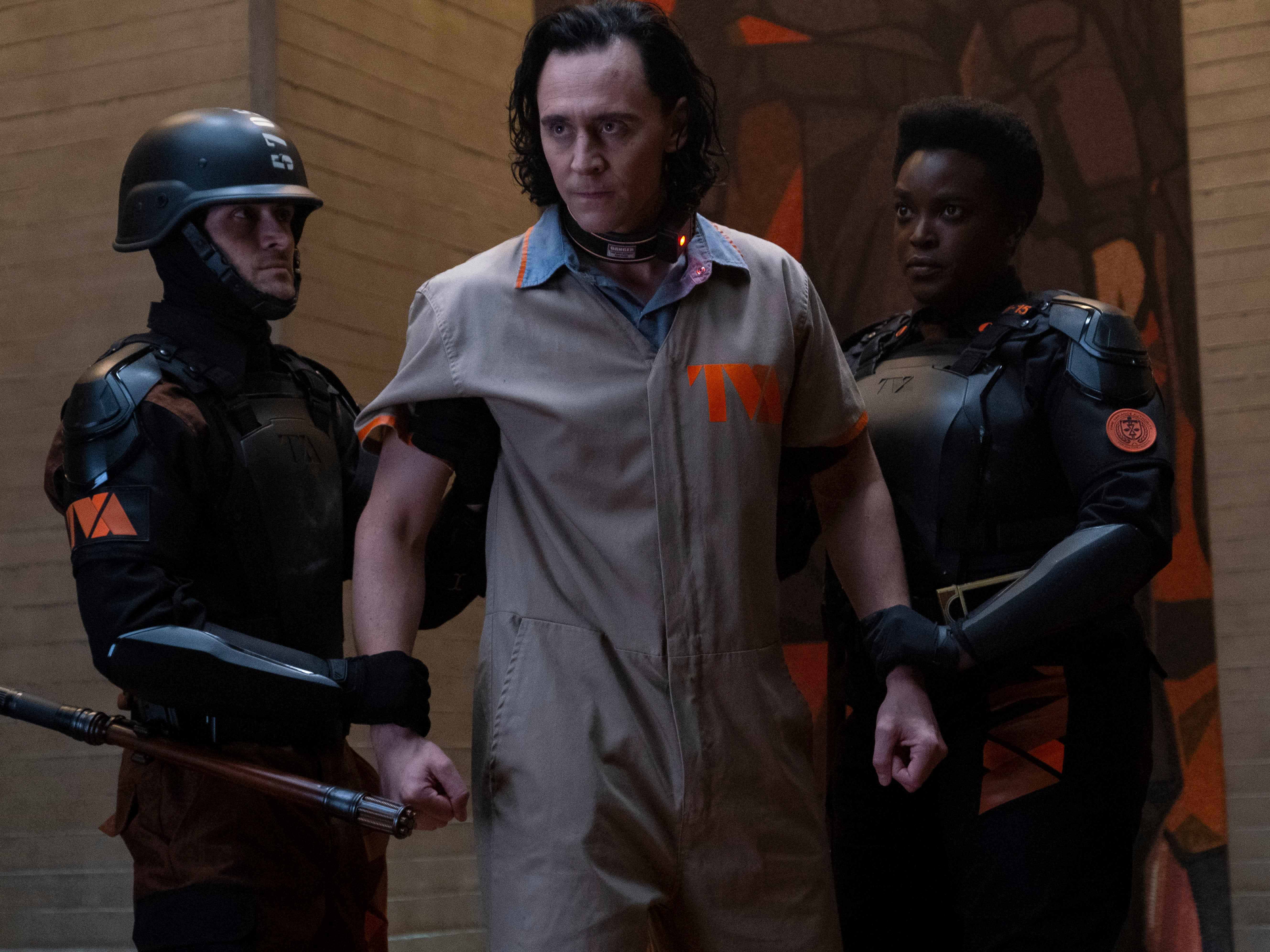 Tom Hiddleston as Loki and Wunmi Mosaku as Hunter B-15 in ‘Loki'